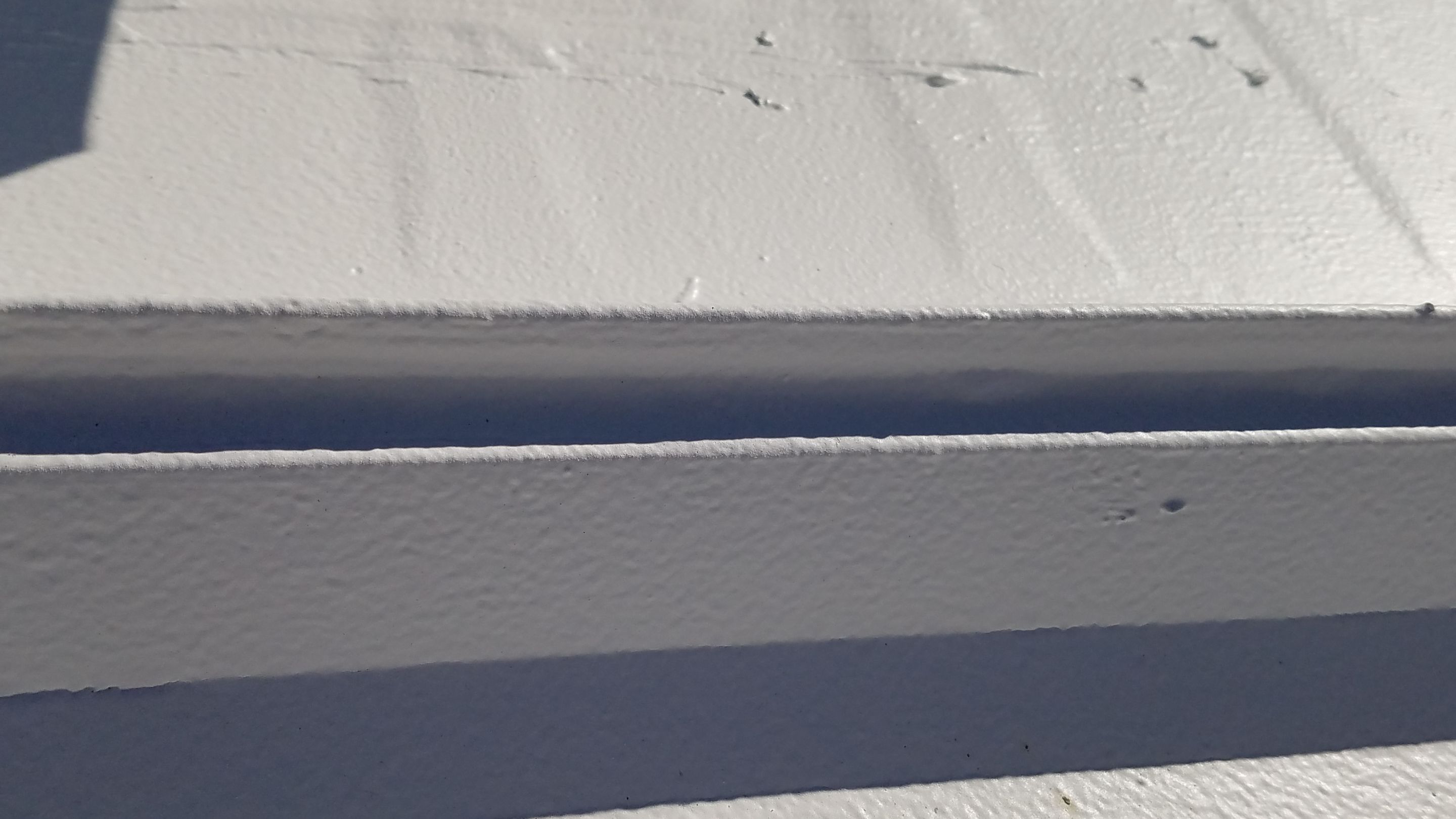Commercial Metal Roof Coating by Gold Star Roofing LLC