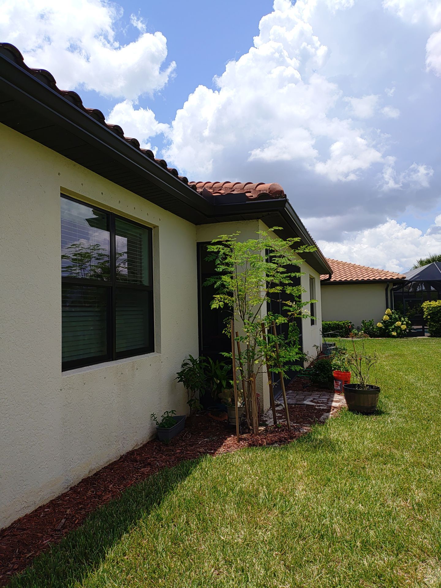 Black 6-Inch Seamless Gutters in Fort Myers FL by Gutter Professor by Gutter Professors