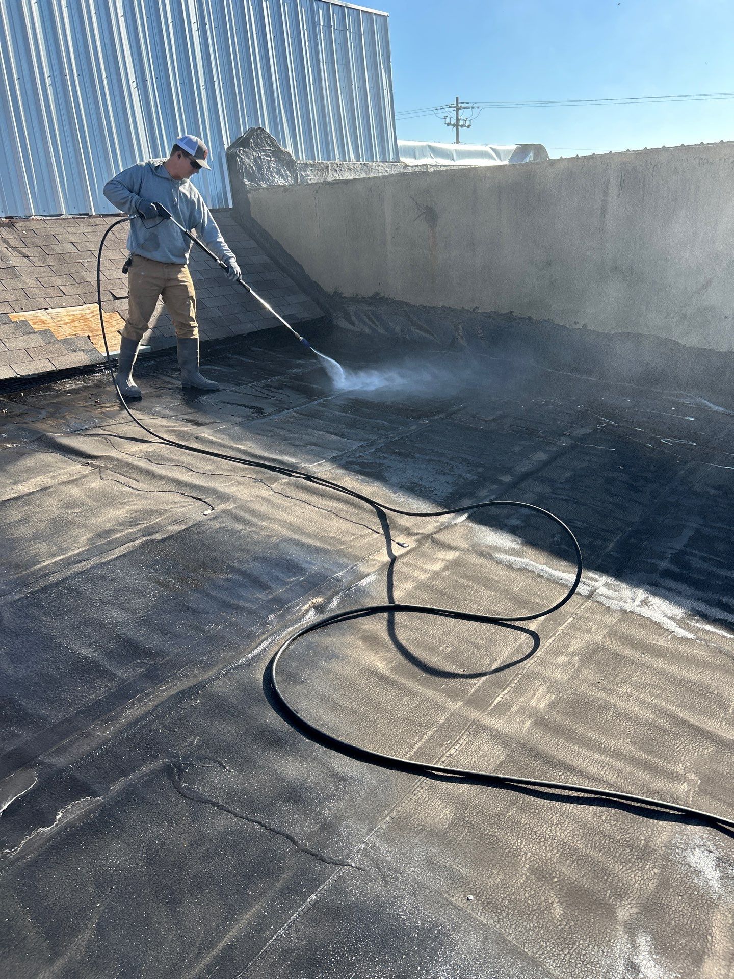 Downtown Gladewater Commercial Foam Roof Restoration – SPF + High-Tensile Acrylic by All Star Roofing LLC