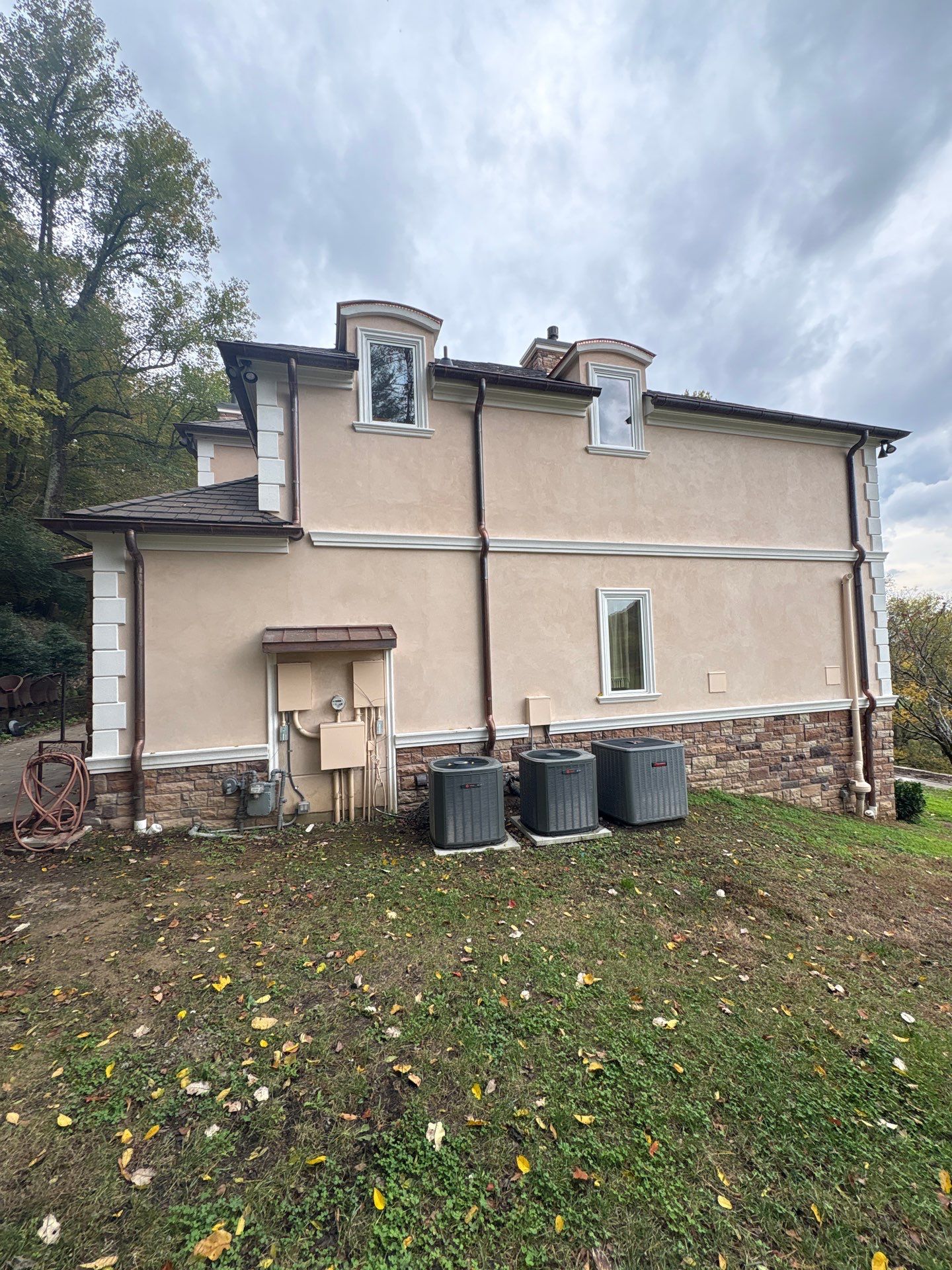 Franklin Exterior Remodel Featuring Custom Stucco and Stone Hardscaping by U.S. Exterior Solutions