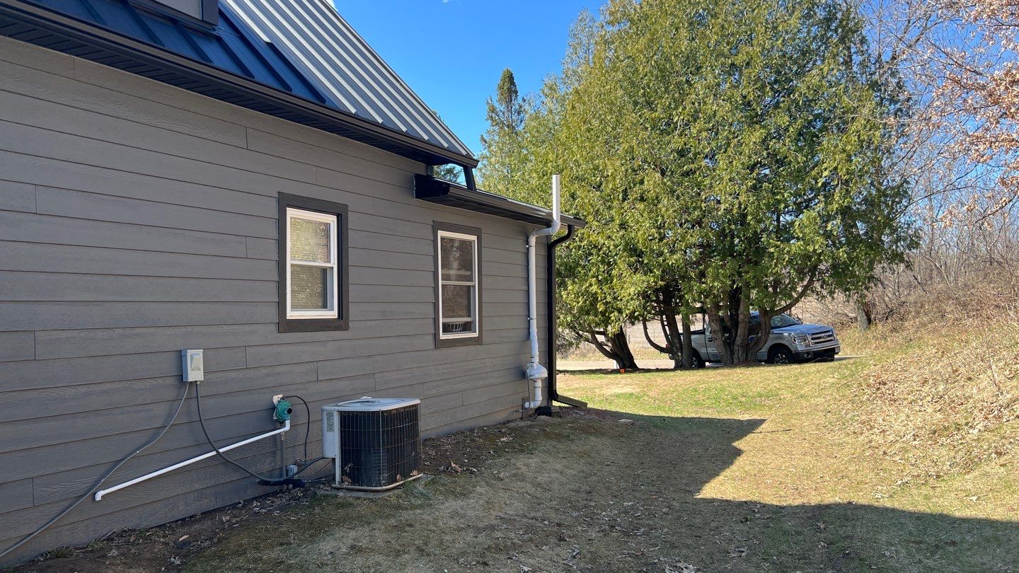  Stunning Home Exterior Makeover | Metal Roofing & LP Smart Siding by Total Restoration Services by LeFever Roofing LLC