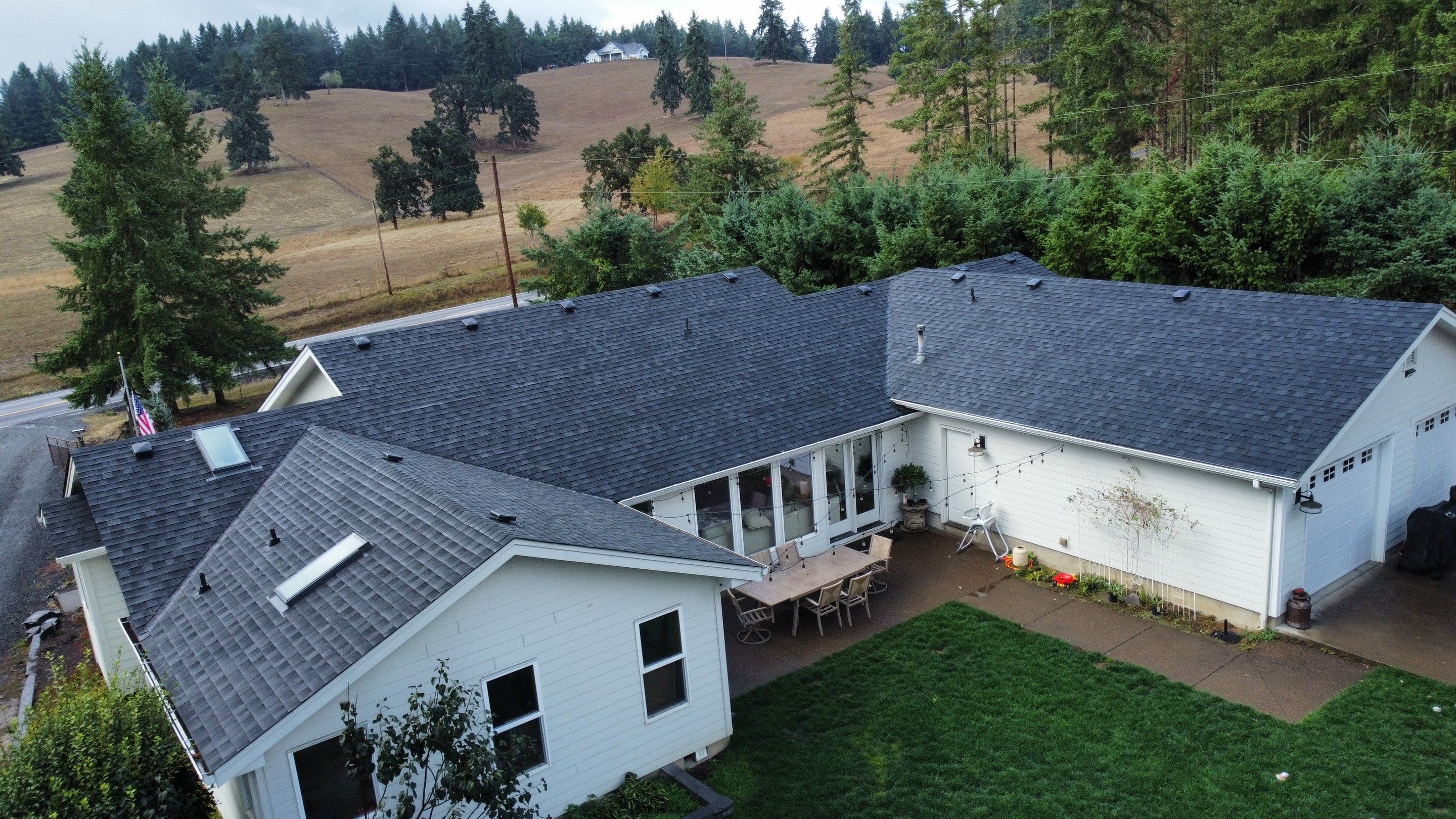 Residential Roofing Installation using IKO Dynasty (Color: Granite Black) by Orezona Building & Roofing Company, Inc.