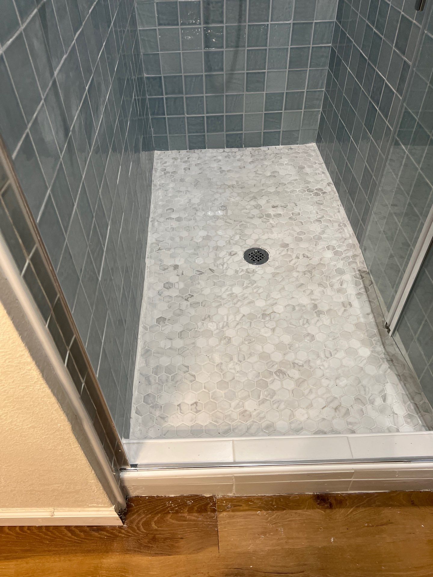 Remodeled and expanded Shower by TXN Remodeling n Construction
