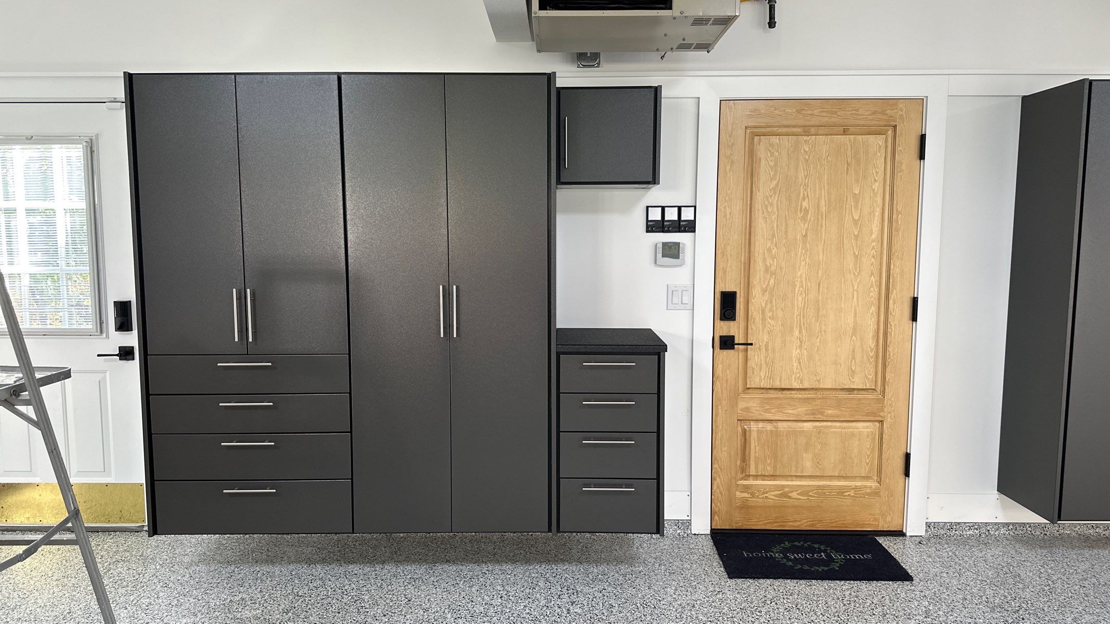 Jim P. upgraded his garage with cabinets  by Banner Garage