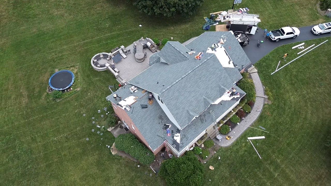 Full Roofing Replacement and Gray Shake Hardie Siding Installation in Butler by Cousins Roofing Siding & Decks
