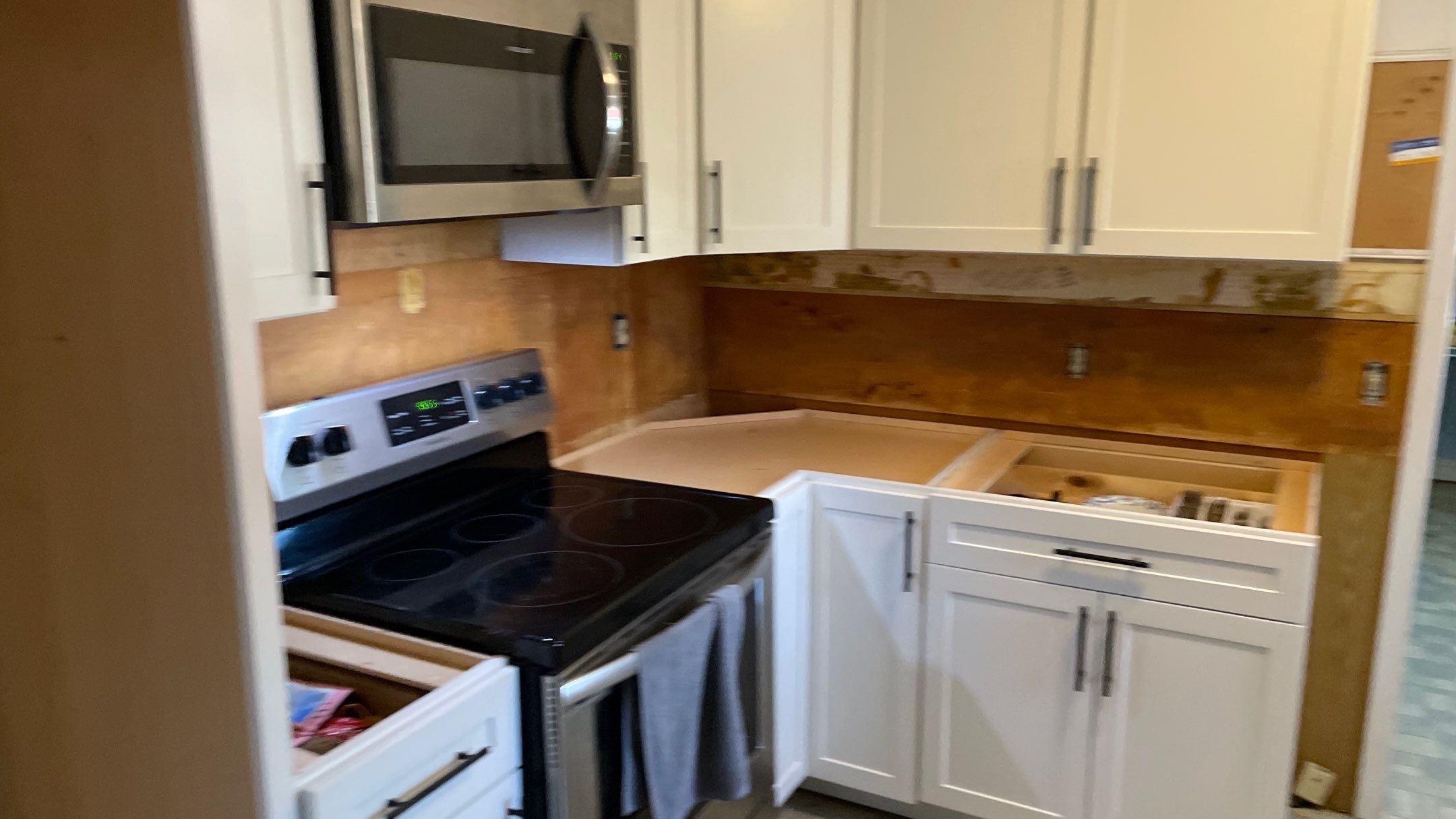 Kitchen Backsplash and Herringbone Tile Floor Remodel by Footprints Floors of Coastal Carolina