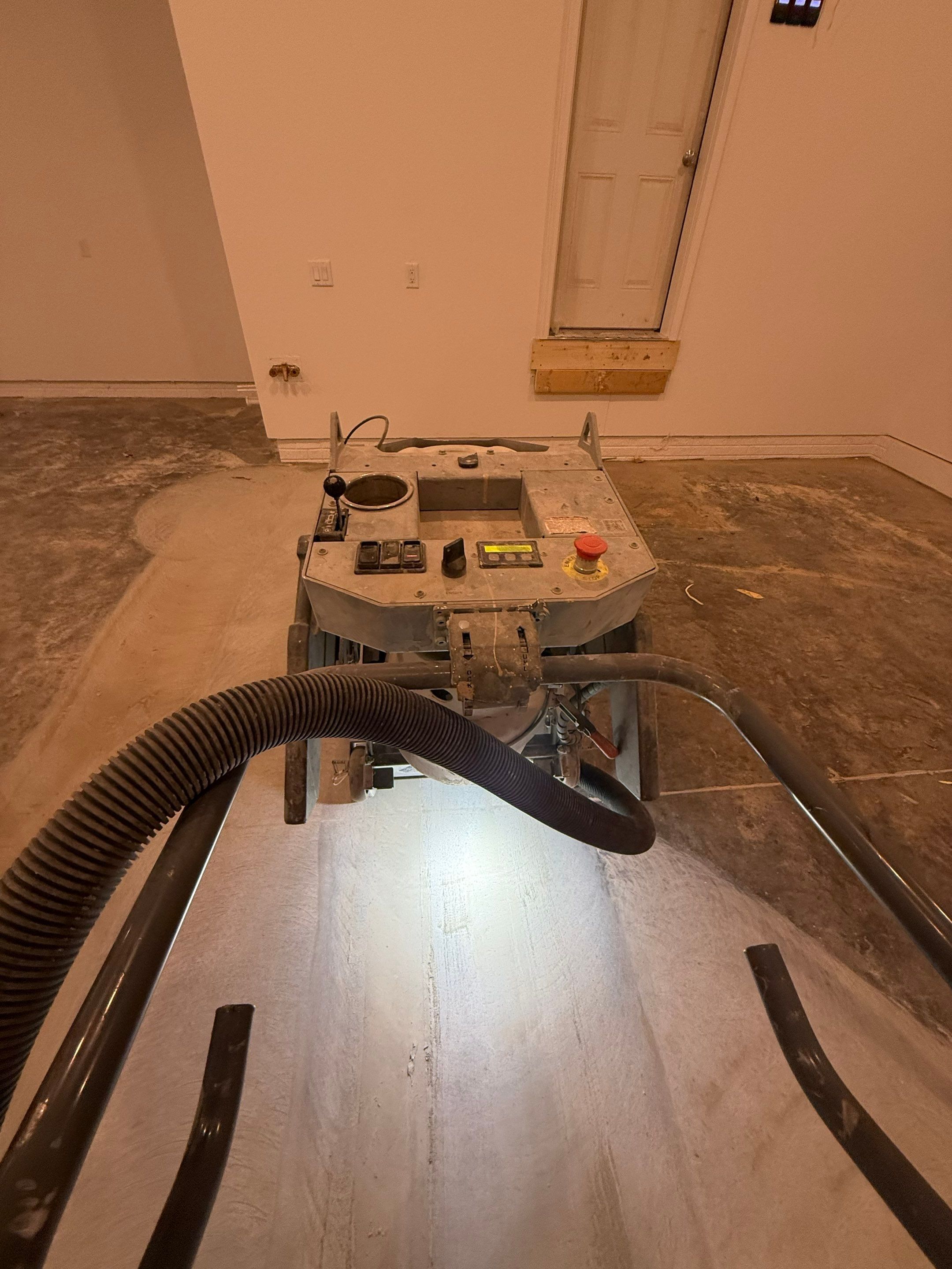 Multi-Car Garage Epoxy Floor Coating and Concrete Finishing in Sioux Falls by Select Painting, Coatings & Garage Cabinets