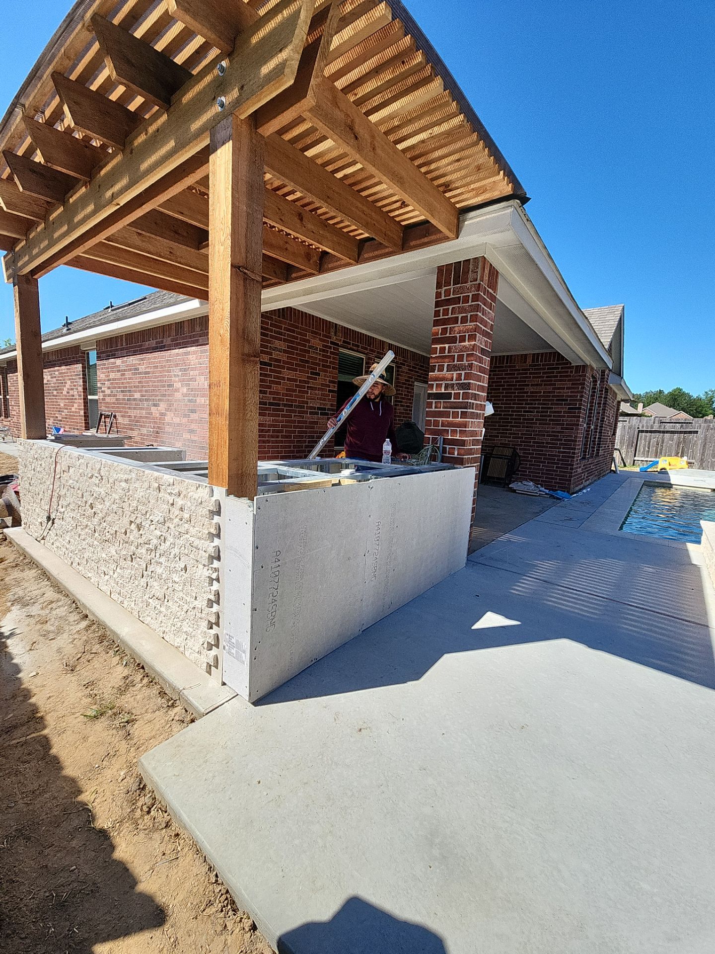 Pergola and Summer Kitchen in Conroe, TX by SophAlx LLC