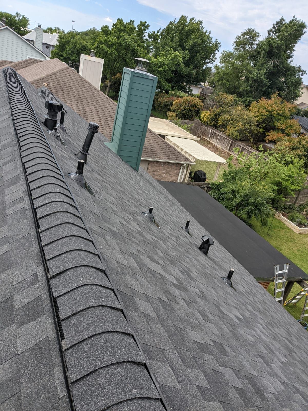 Residential Roofing Installation using Owens Corning Duration Tru Def Onyx Black by DeZign Roofing & Exteriors