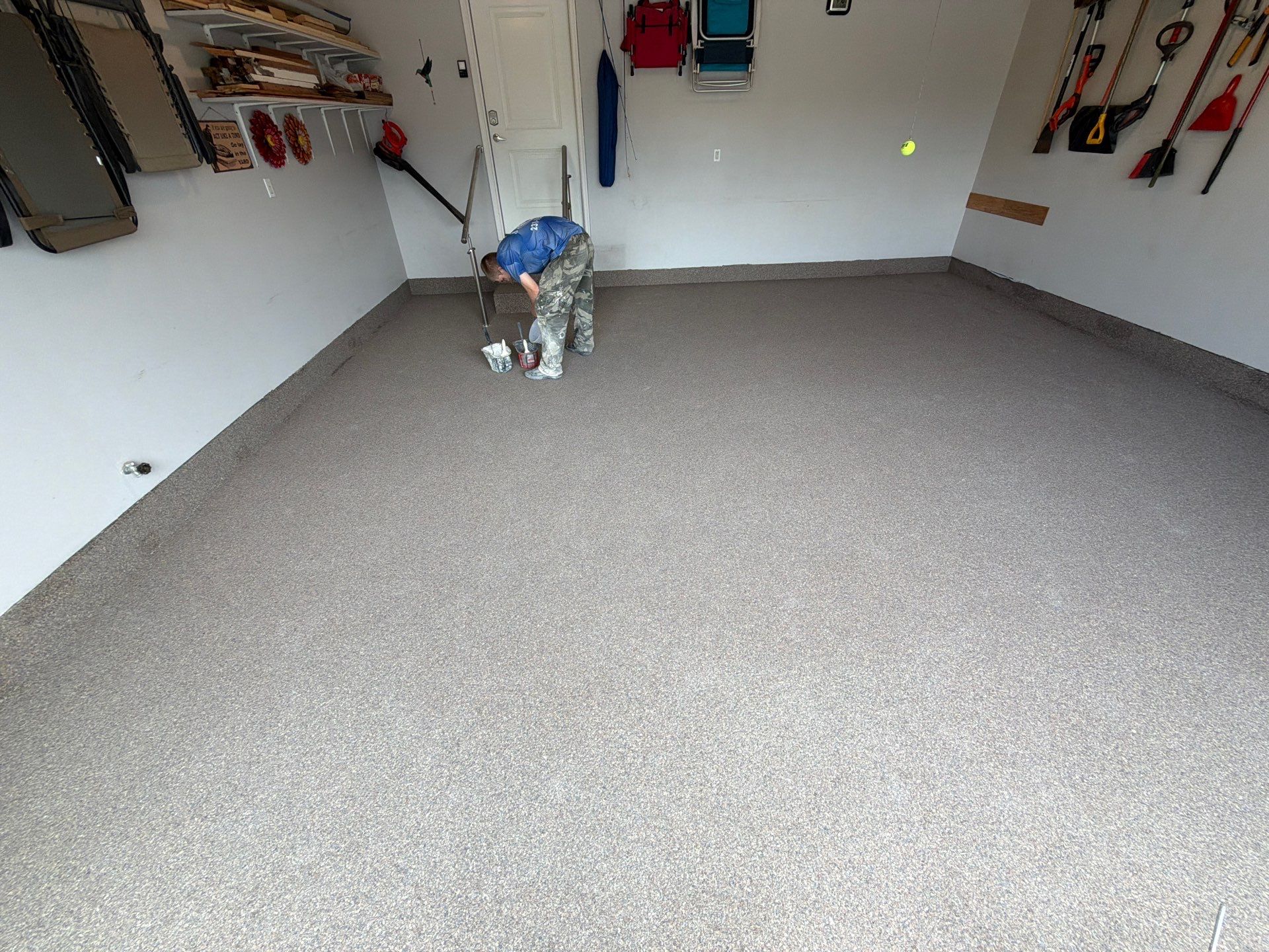 Garnet Polyaspartic Flake Garage Floor Installation in Zeeland by Gordon Painting