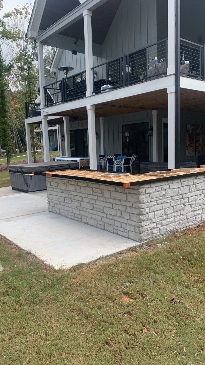 Outdoor Kitchen on Lake Keowee by Xtreme Concrete Services