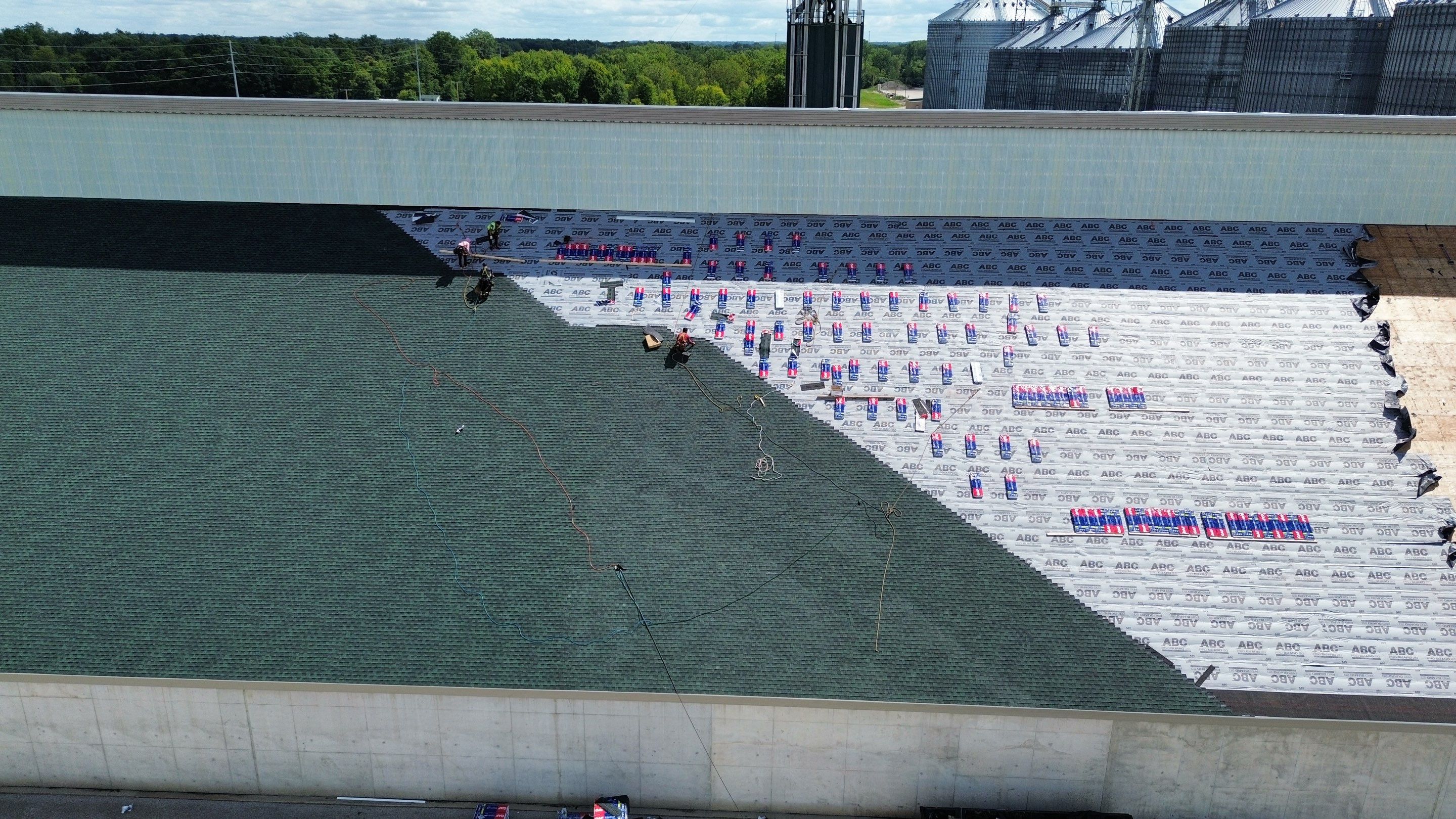 Commercial Roofing Installation using Timberline HDZ Shingles - Hunter Green by RoofX 