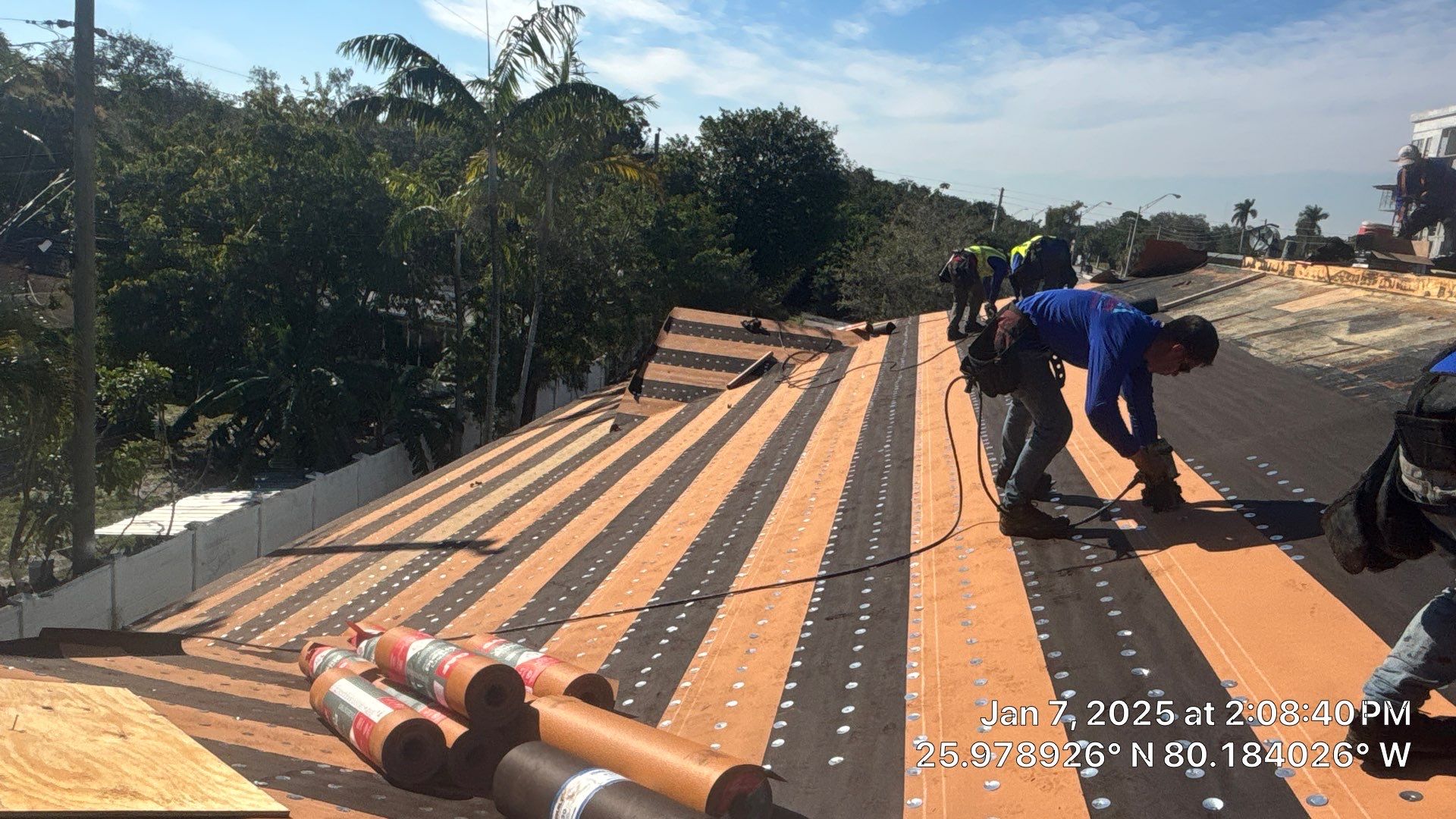COMMERCIAL REROOF 24 GUAGE MEDIUM BRONZE 1-1/2" MECHANICAL SEAM "ZEBRA METHOD" by Earl W. Johnston Roofing 