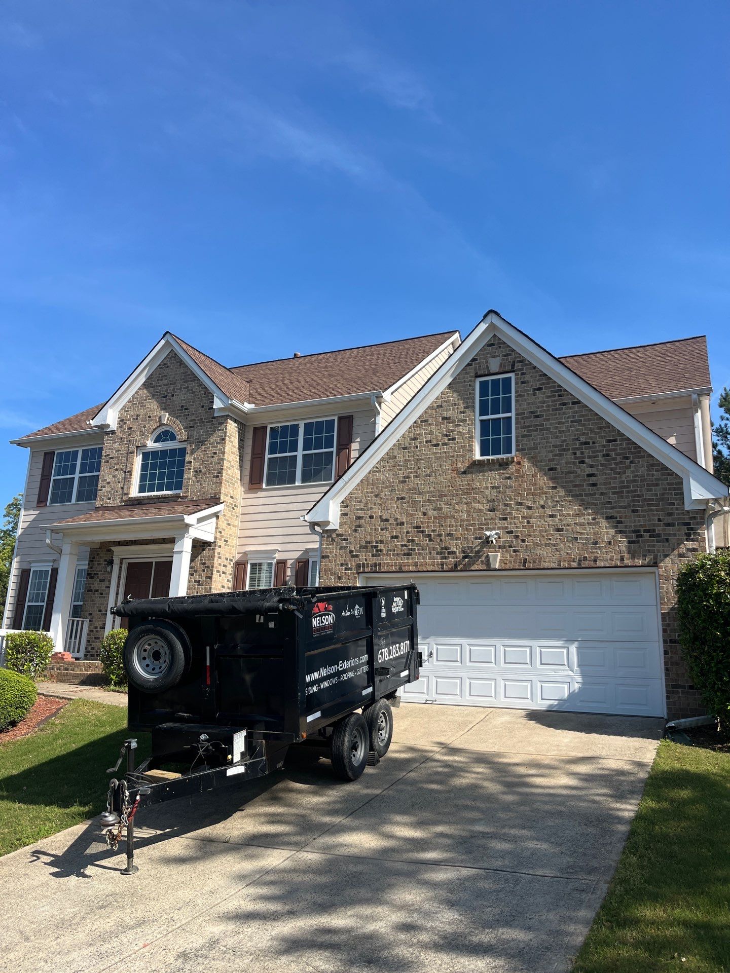 Window & Rotted Wood Replacement, Deck Stain, and Exterior Paint by Nelson Exteriors