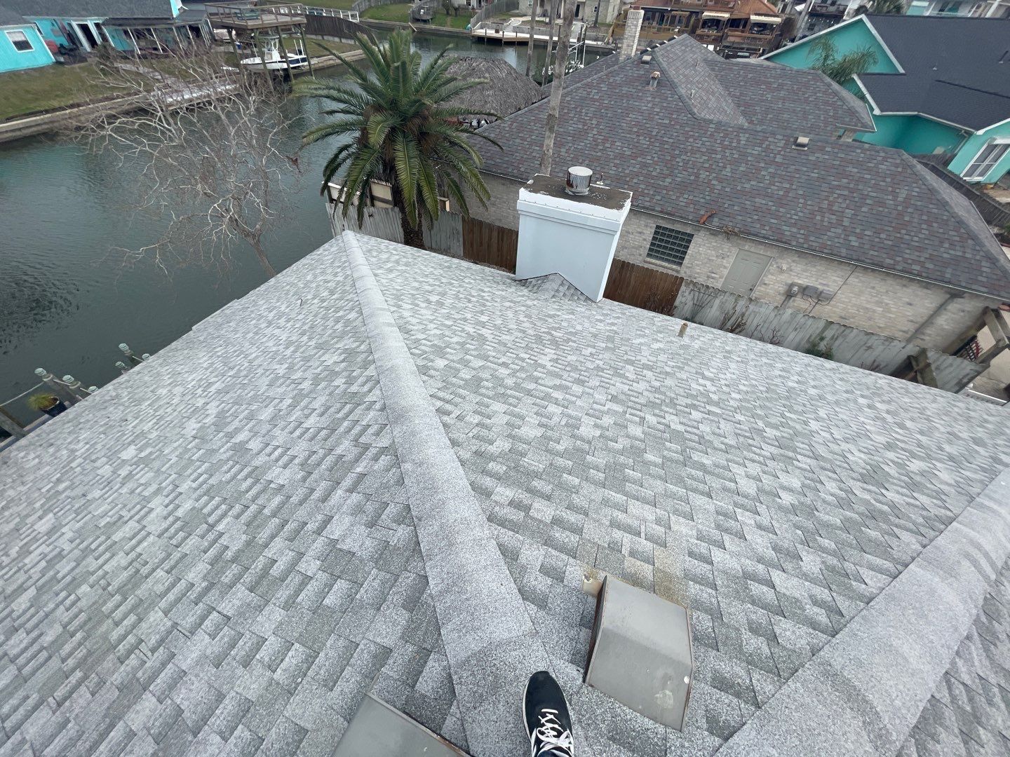 Residential Roofing Repair using Galvanized Chimney Cap & Chase by Lighthouse Roofing