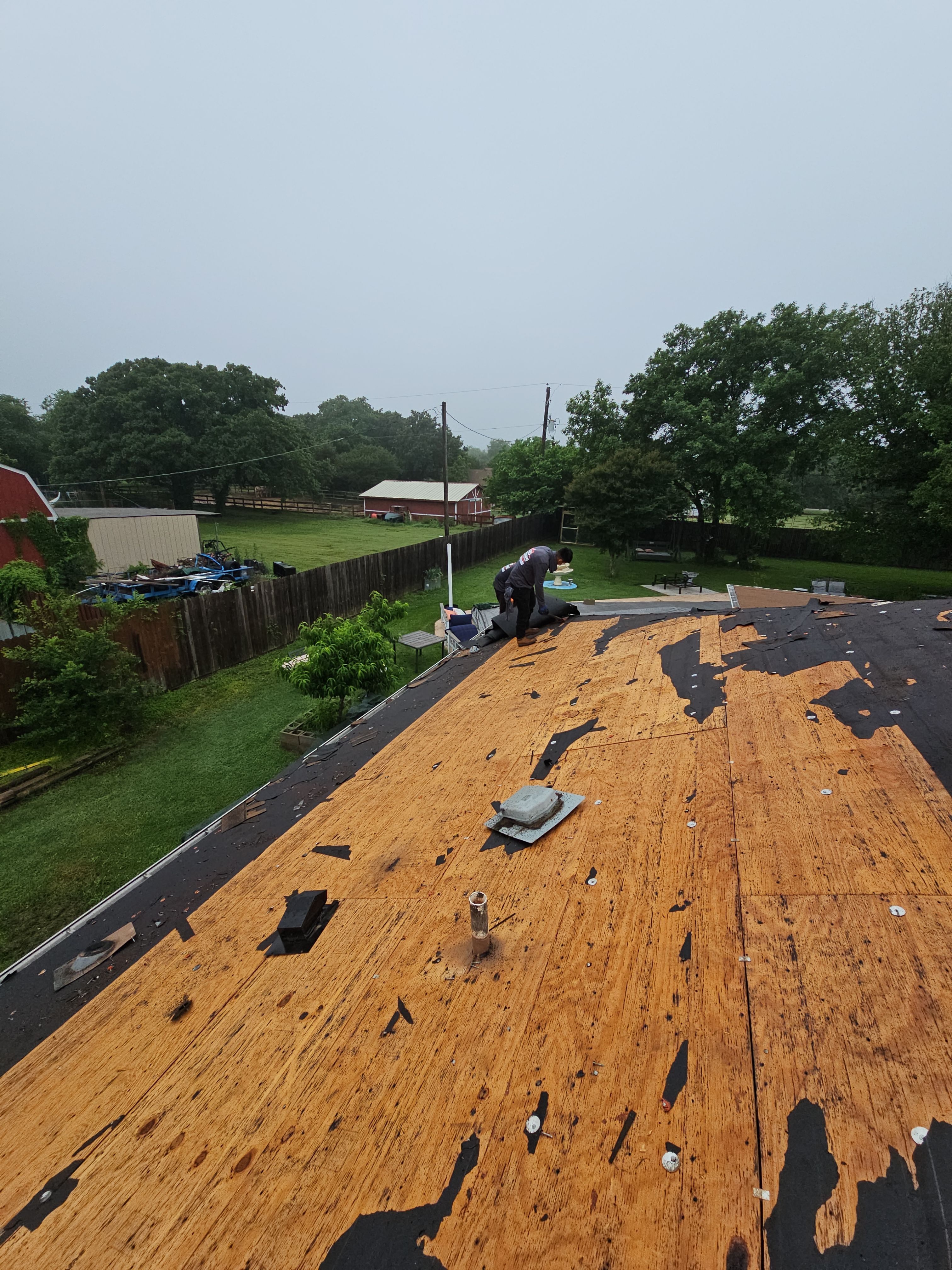 "Full Roof Replacement Due to Hail and Water Damage – Before & After" by road roofing llc