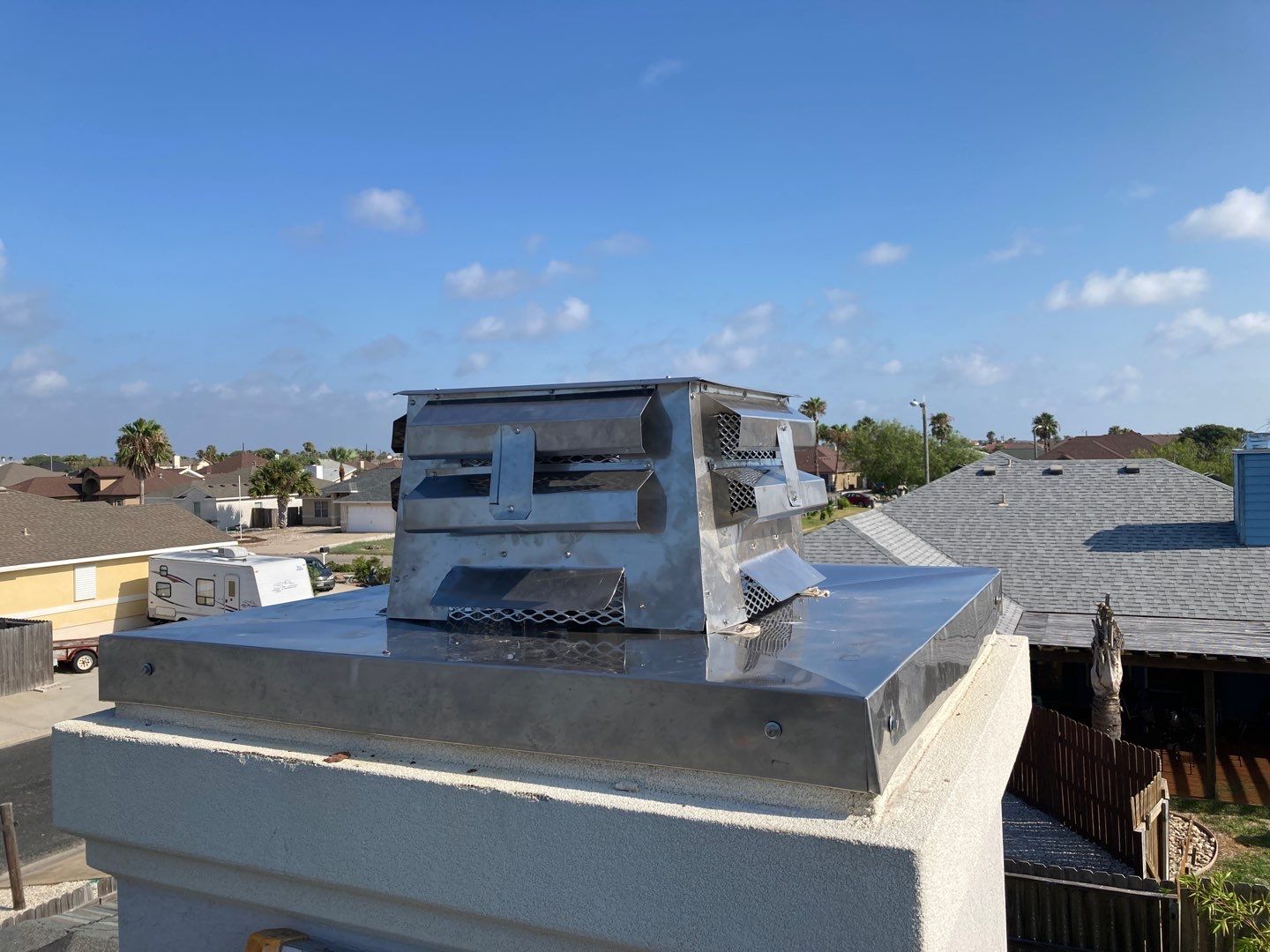 Chimney Cap & Chase Replacement using Custom Fabricated Stainless Steel by Lighthouse Roofing