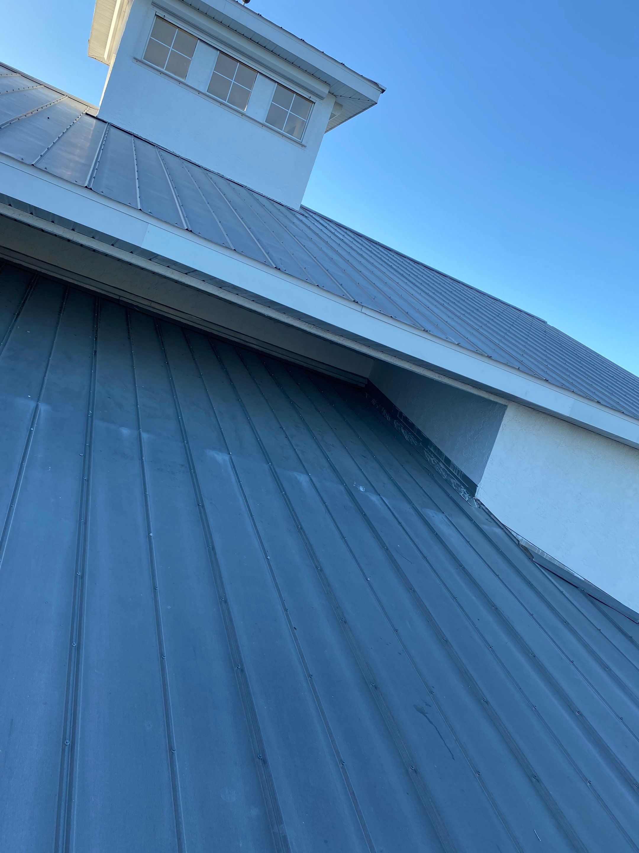 Seamless Gutter Installation for Beach Homes in Sarasota FL by Gutter Professors