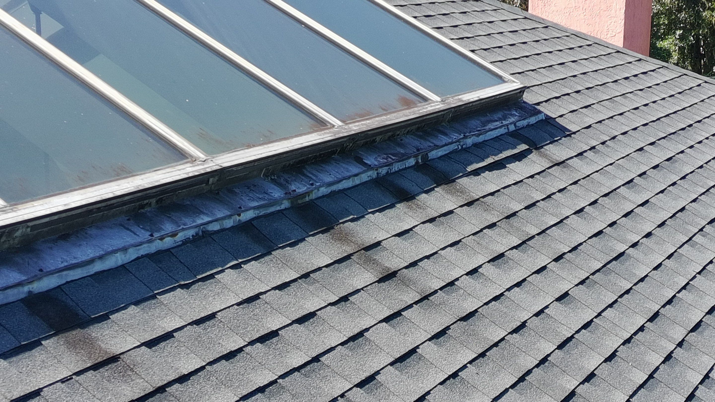 Ridge Skylight Repair and Shingle Roof Maintenance in Winter Park by Fortified Roofing Solutions Corp.