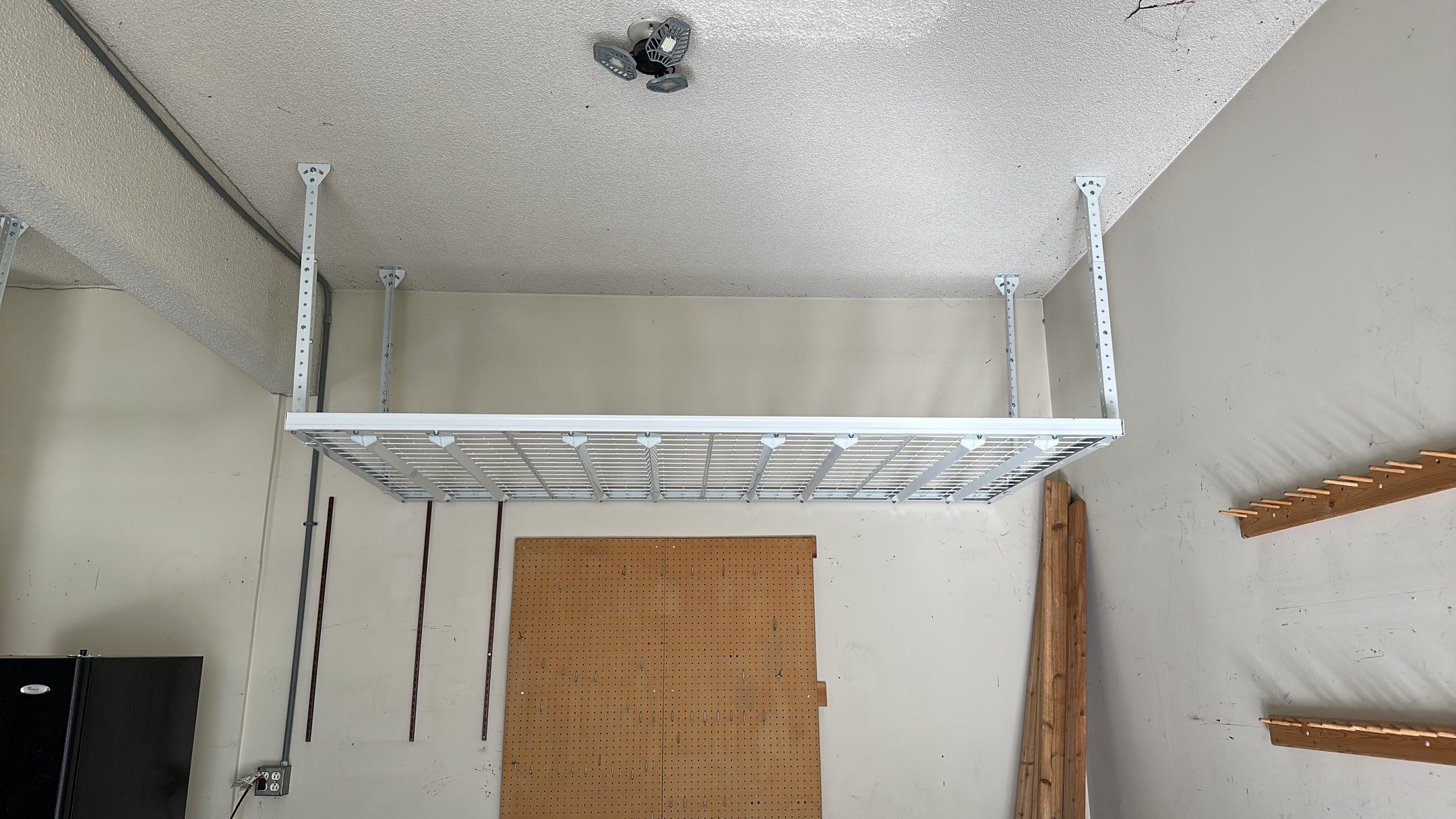 Jeff K. upgraded his garage with these overhead racks  by Banner Garage
