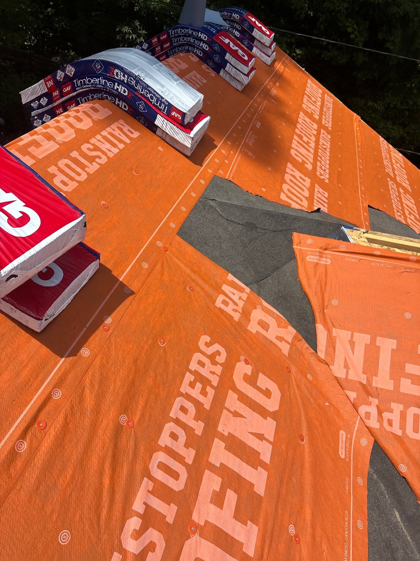 Residential Roofing Installation using GAF TImberline HDZ Hickory by Rainstoppers Roofing