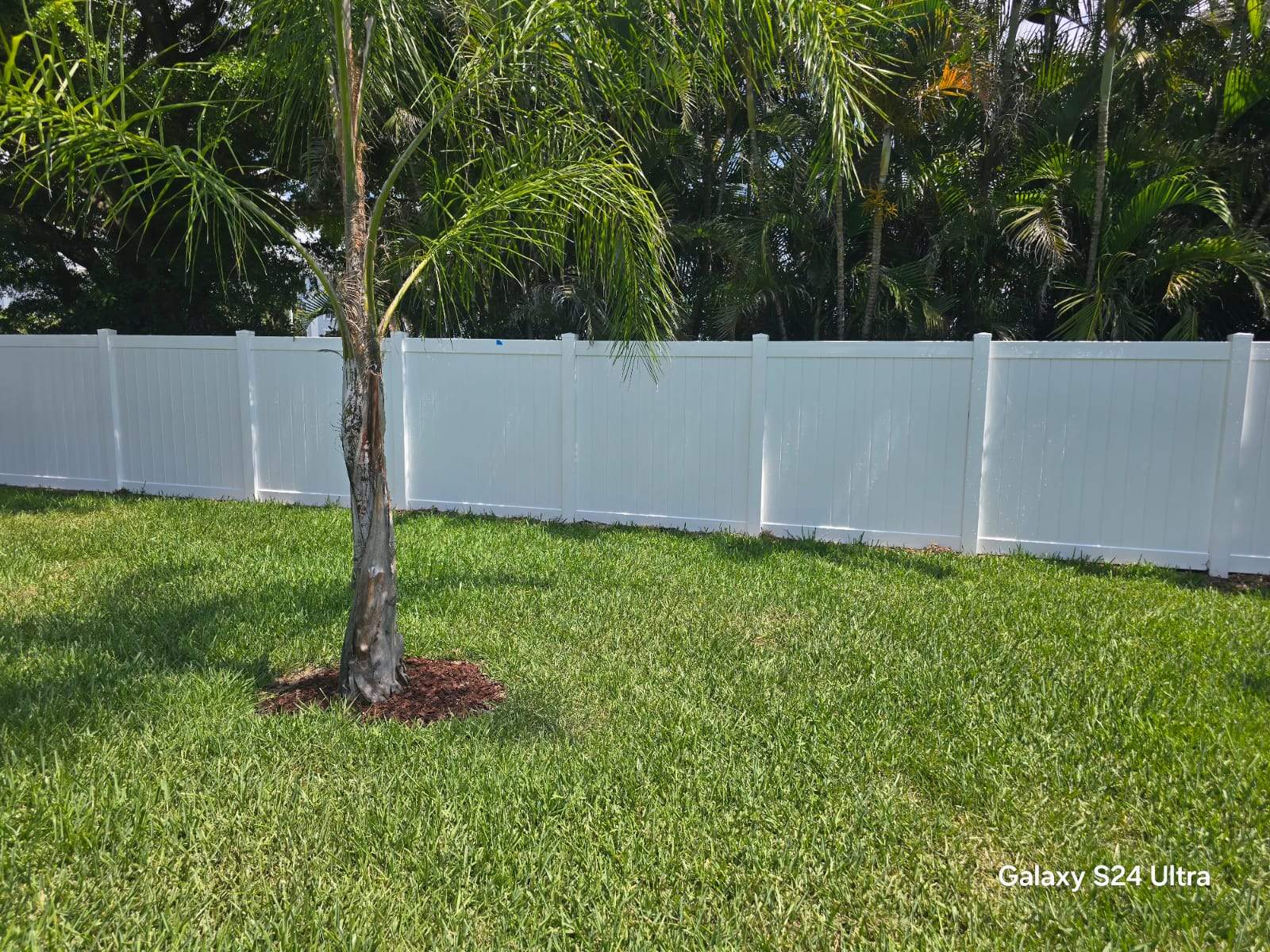 White Vinyl Privacy Fence and Double Gate Installation in Fort Myers by True Fence LLC