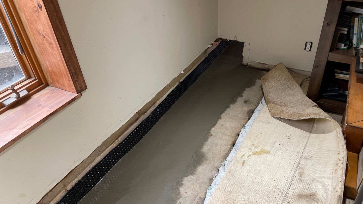 Completing the Connection for Lisa's Drain Tile System by Waterproofing Northeast
