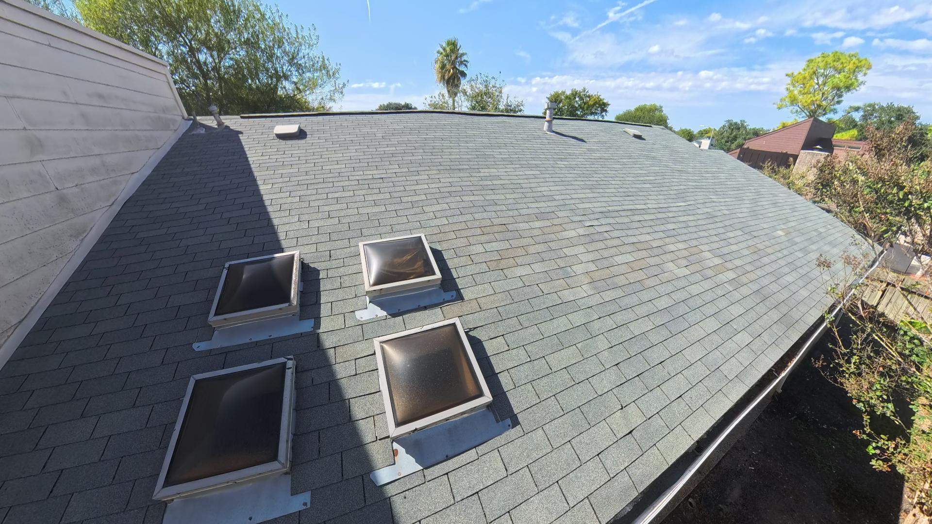 Asphalt Shingle Roof Repair and Skylight Sealing in Houston by One Legacy United