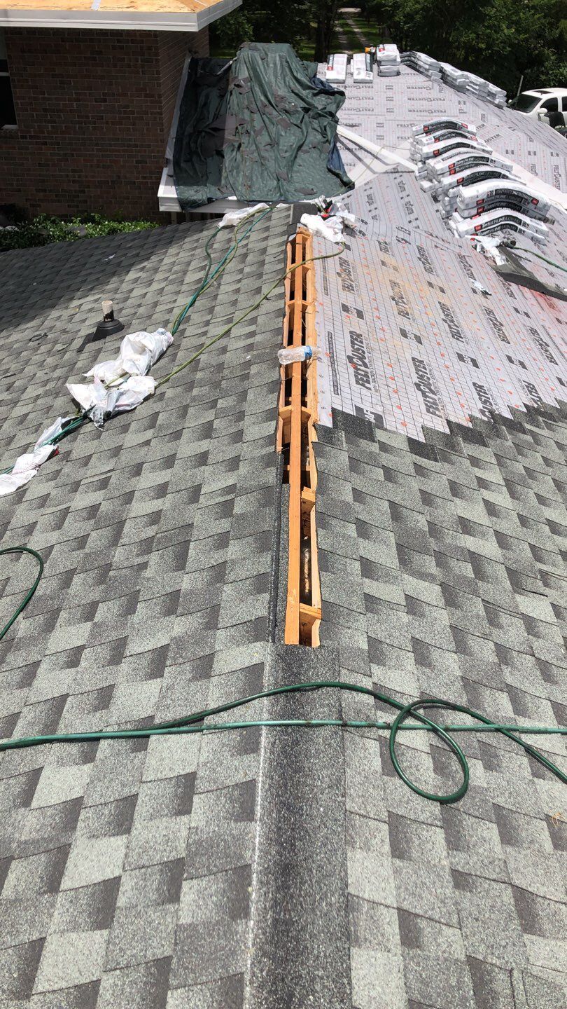 Residential Roofing Installation using Roof Replacement by American Roofing & Construction LLC