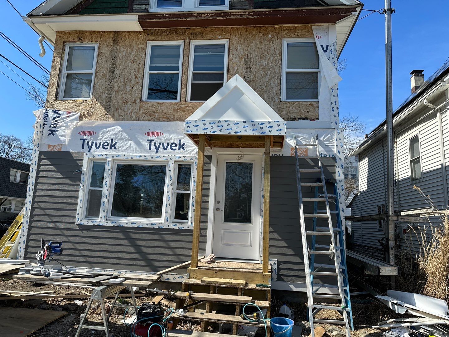 Siding Installation using Hardie Plank Aged Pewter by A Plus Exterior
