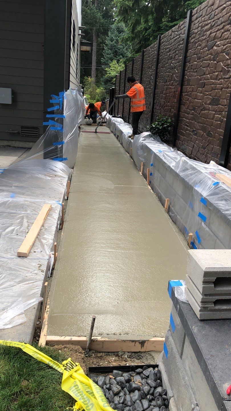 Bruce | Broom Finish Driveway, Concrete Project by Jireh Asphalt & Concrete Inc 