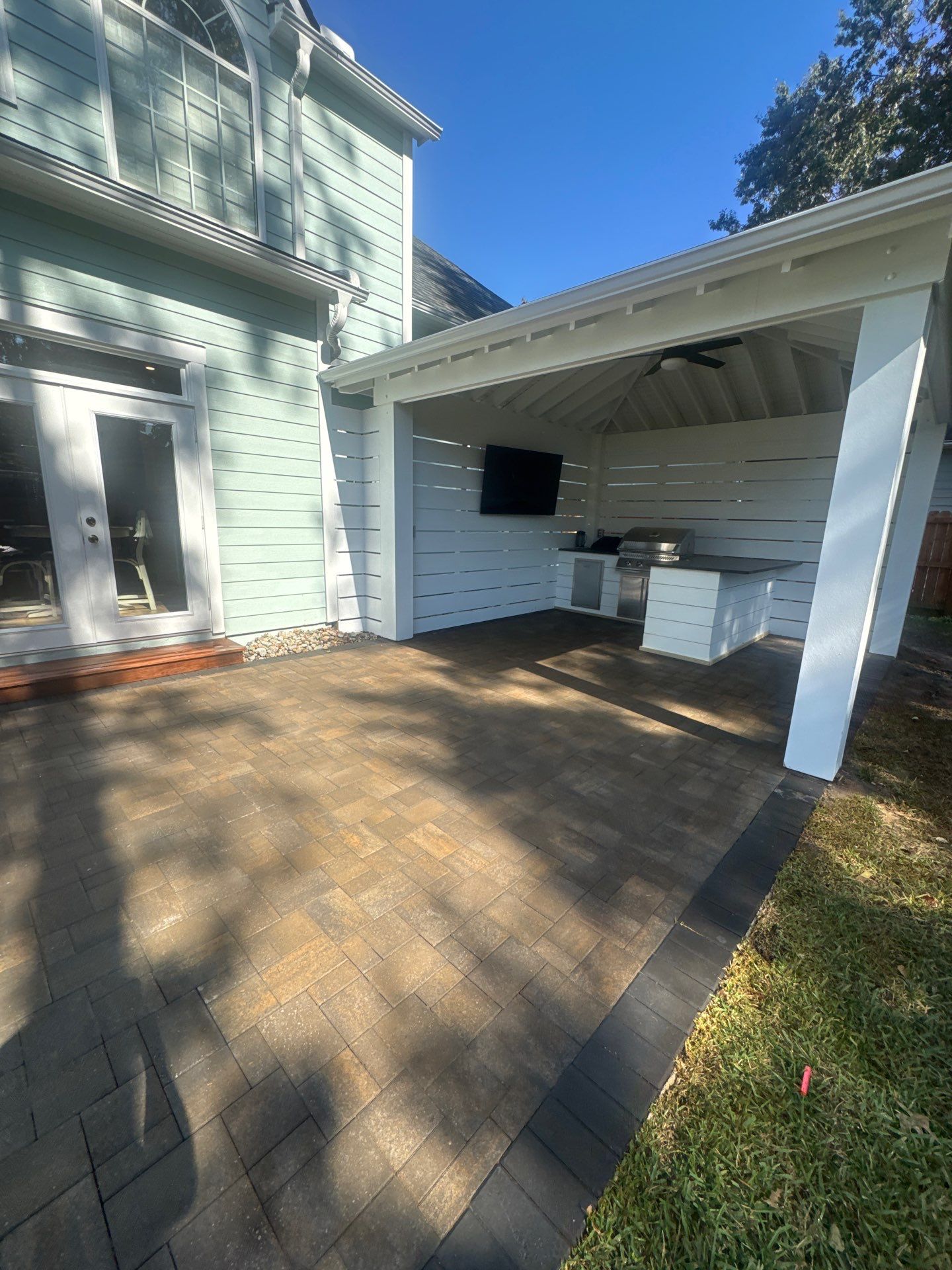 Weathered Fence and Patio using Wood Sealant and Concrete Sealant by DuraSeal