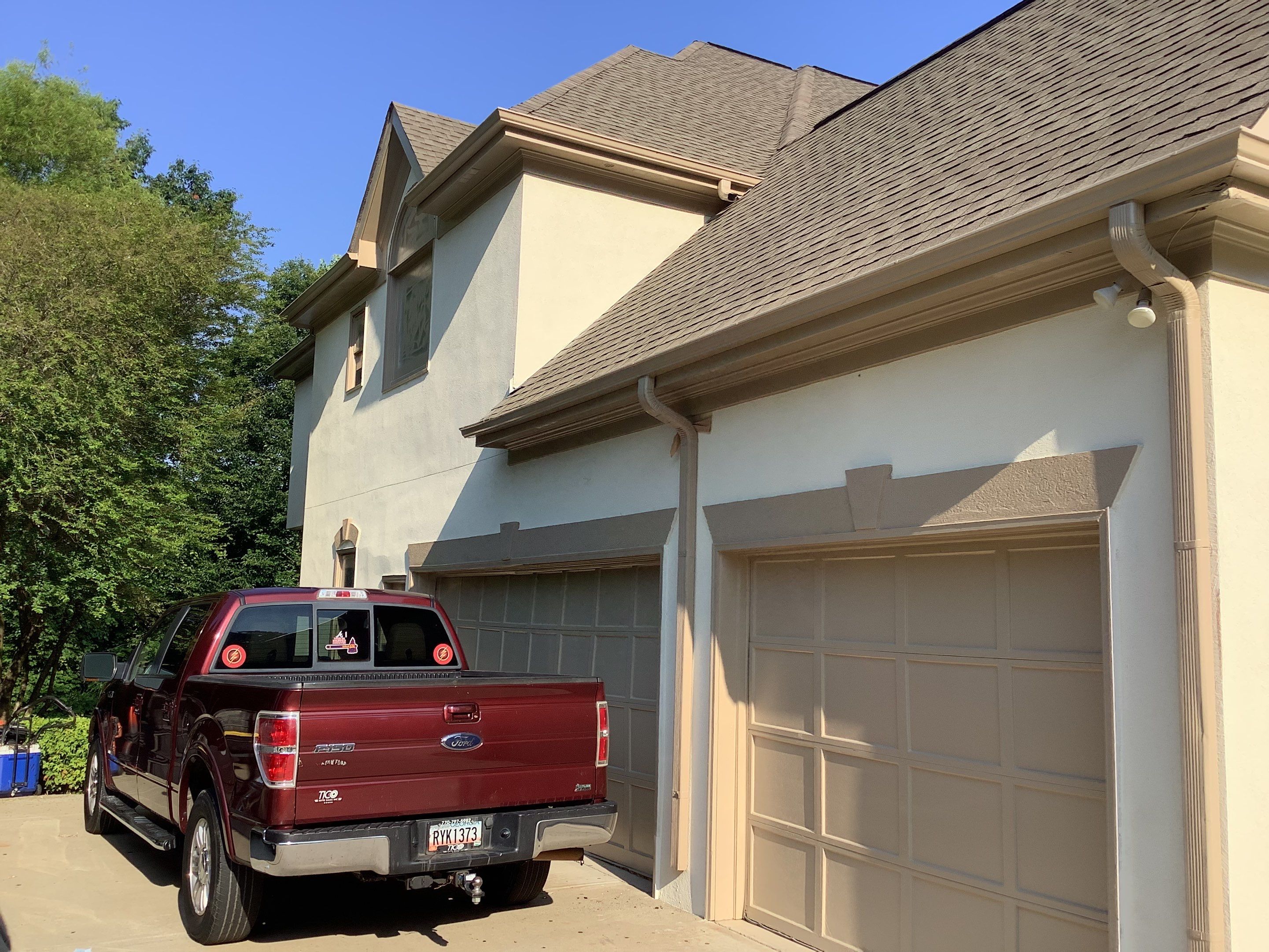 Stucco Exterior Painting and Deck Refinishing in Duluth by Swift Home Renovations
