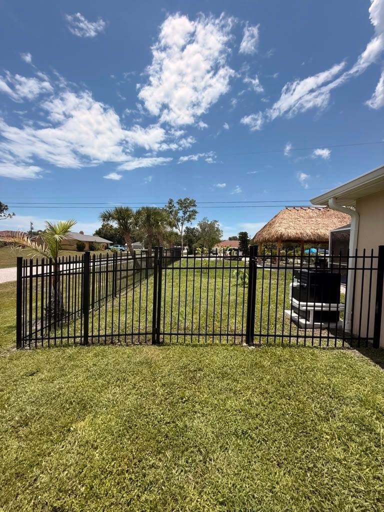 Black Aluminum Spear Top Picket Fence Installation in Englewood by True Fence LLC