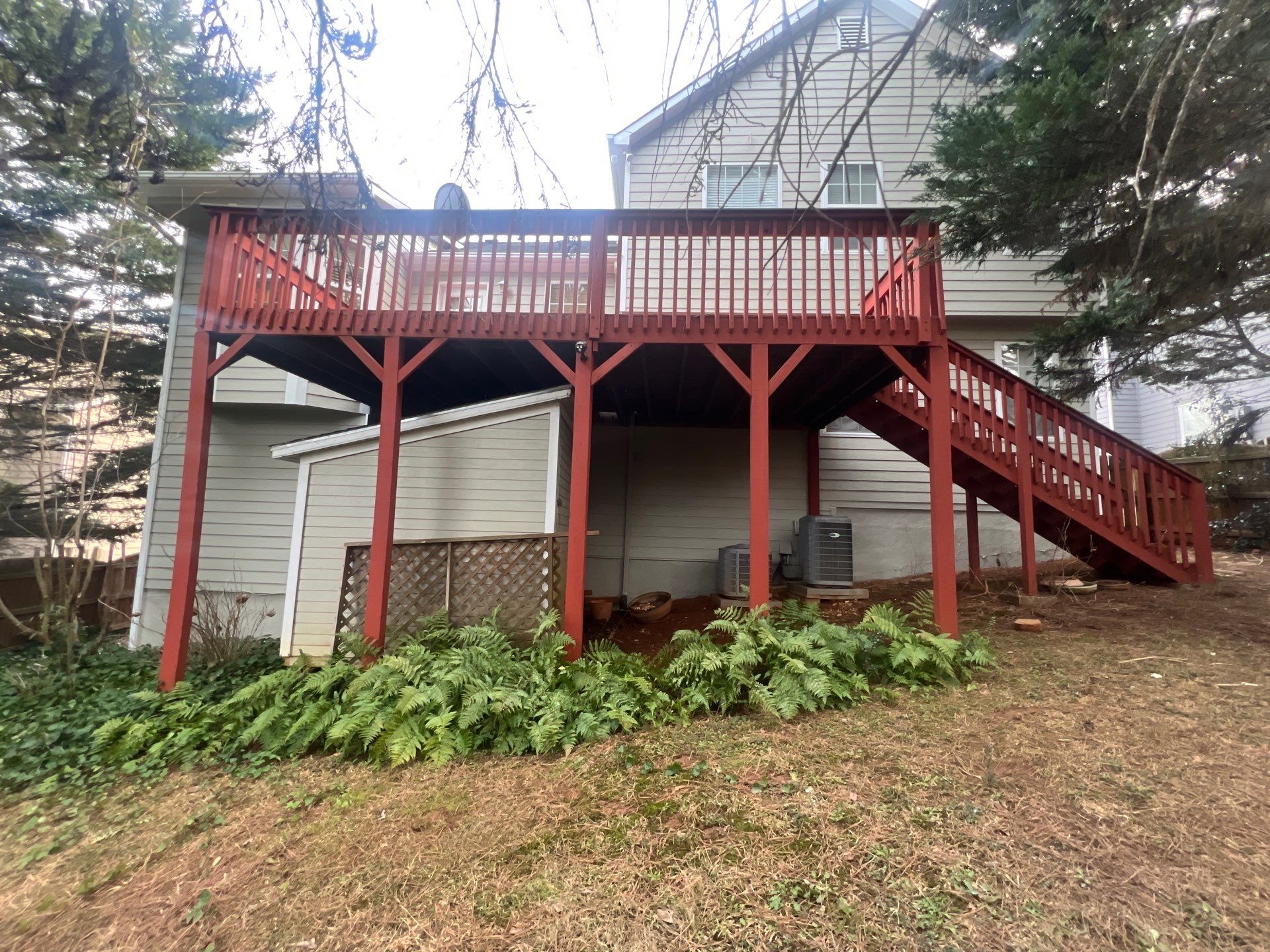Exterior Residential Painting and Deck Staining in Kennesaw, Georgia by Swift Home Renovations
