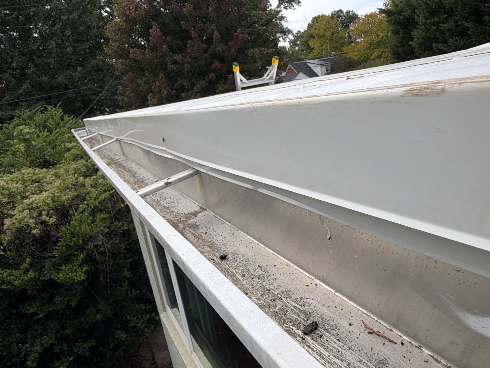 Richmond Roof Replacement Including Flat Membrane and Asphalt Shingles by Cade Construction
