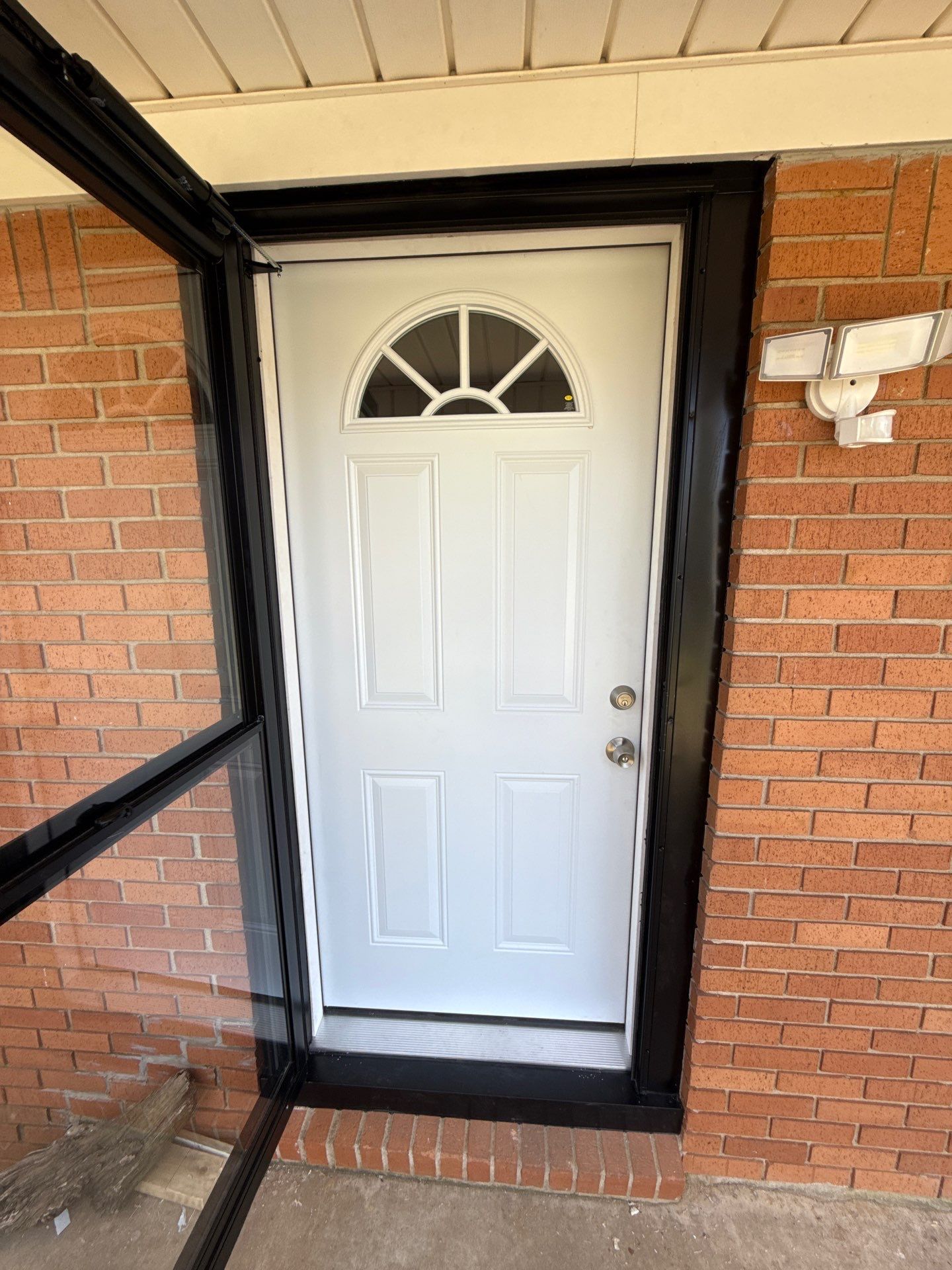 Exterior door & storm door installation by In & Out Construction & Remodeling, LLC