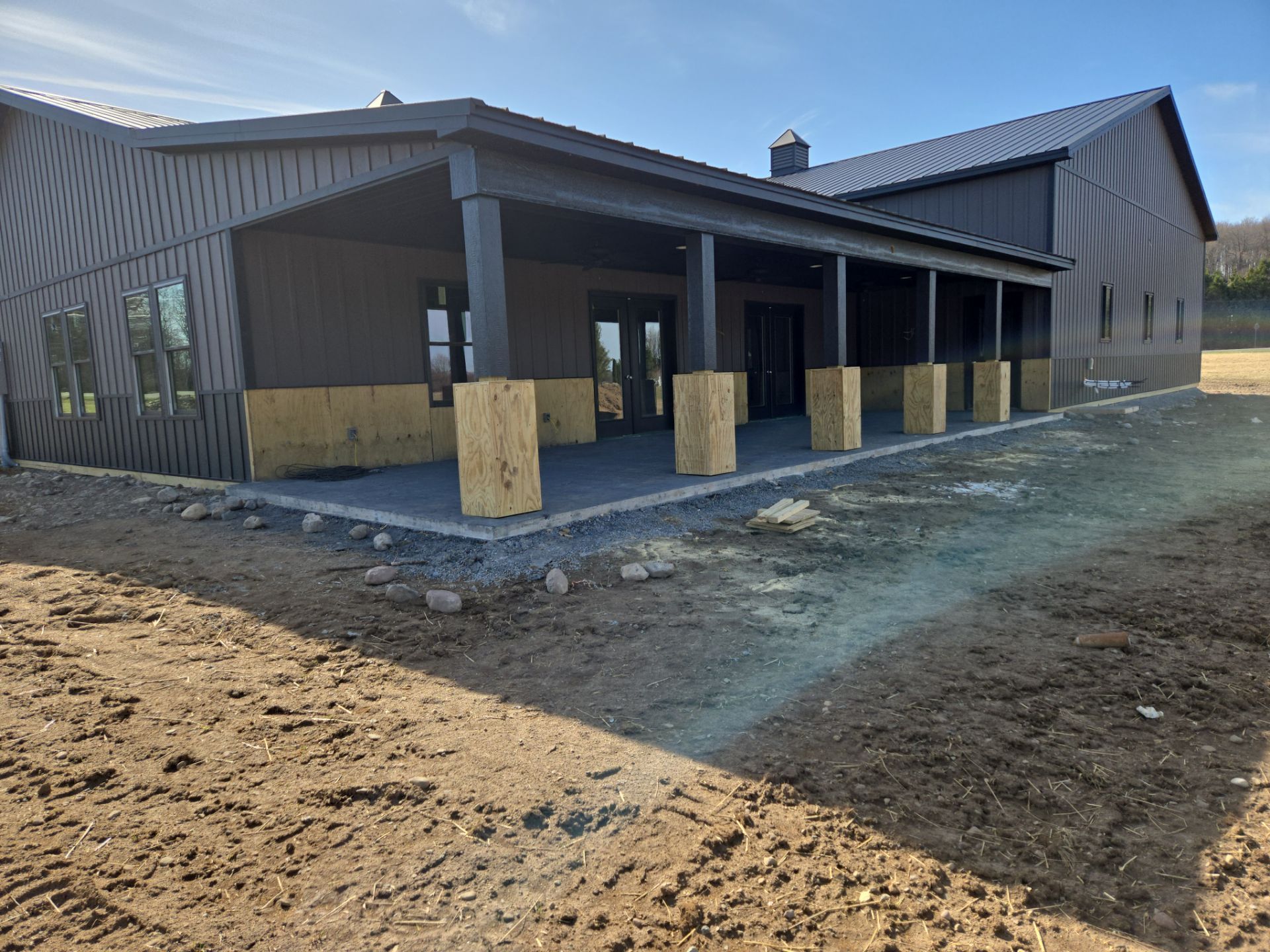 Barndominium  using Textured Board & Batton by Horst Custom Homes 