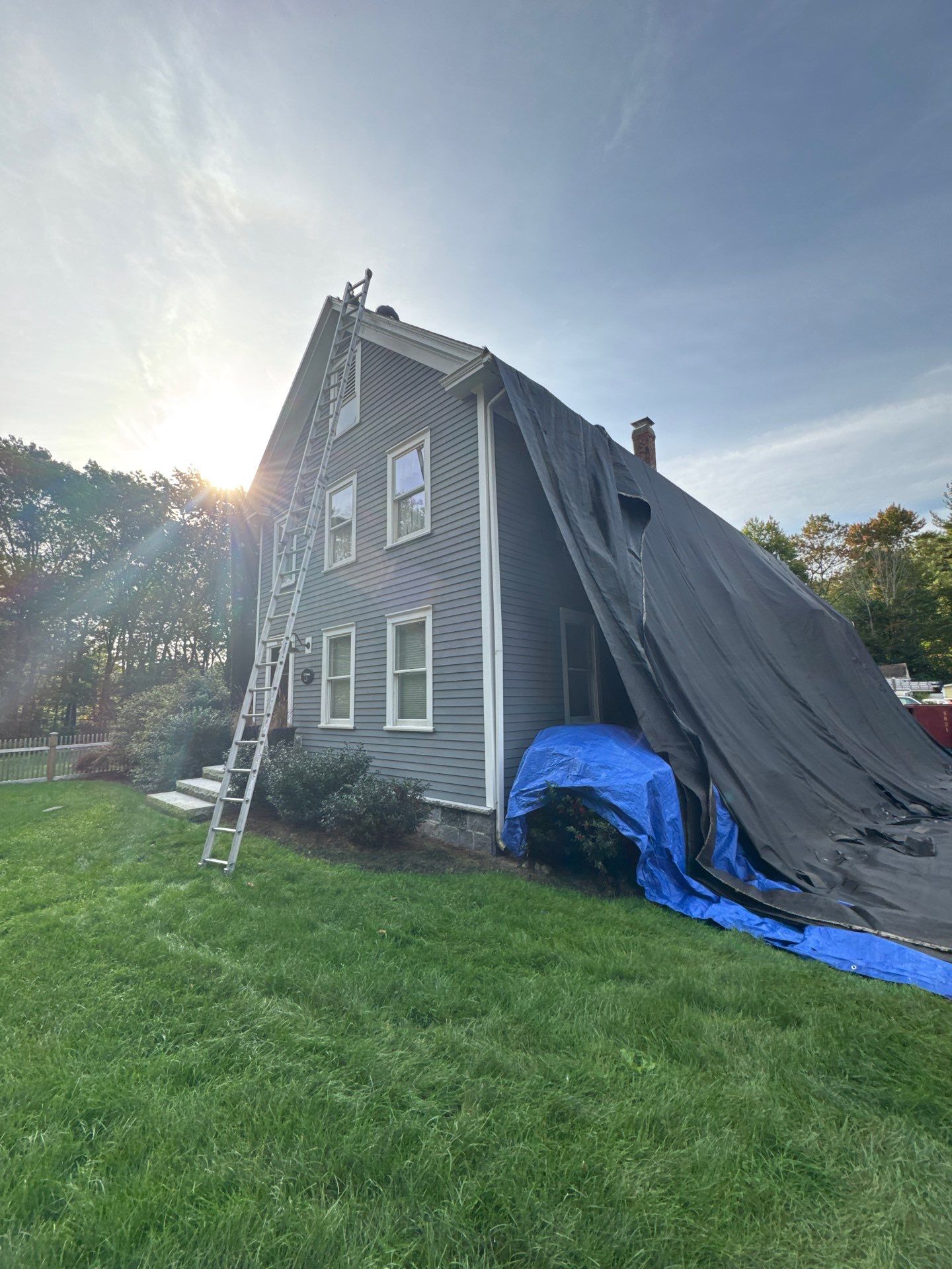 Roof Replacement & Chimney Removal – Westford, MA by Mighty Dog Roofing of Greater Middlesex County