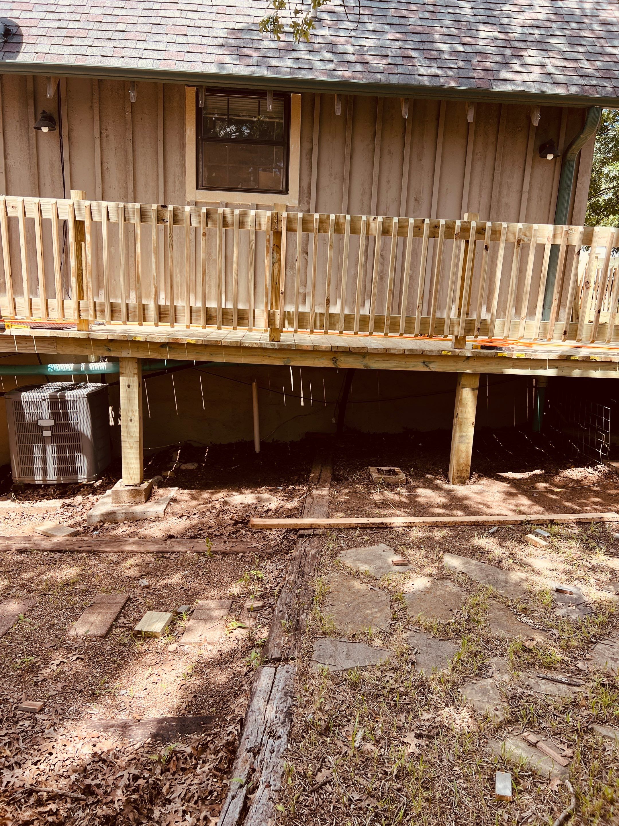 Architectural Shingle Roof Replacement and Skylight Installation in Sulphur by BANA Roofing and Solar Supply