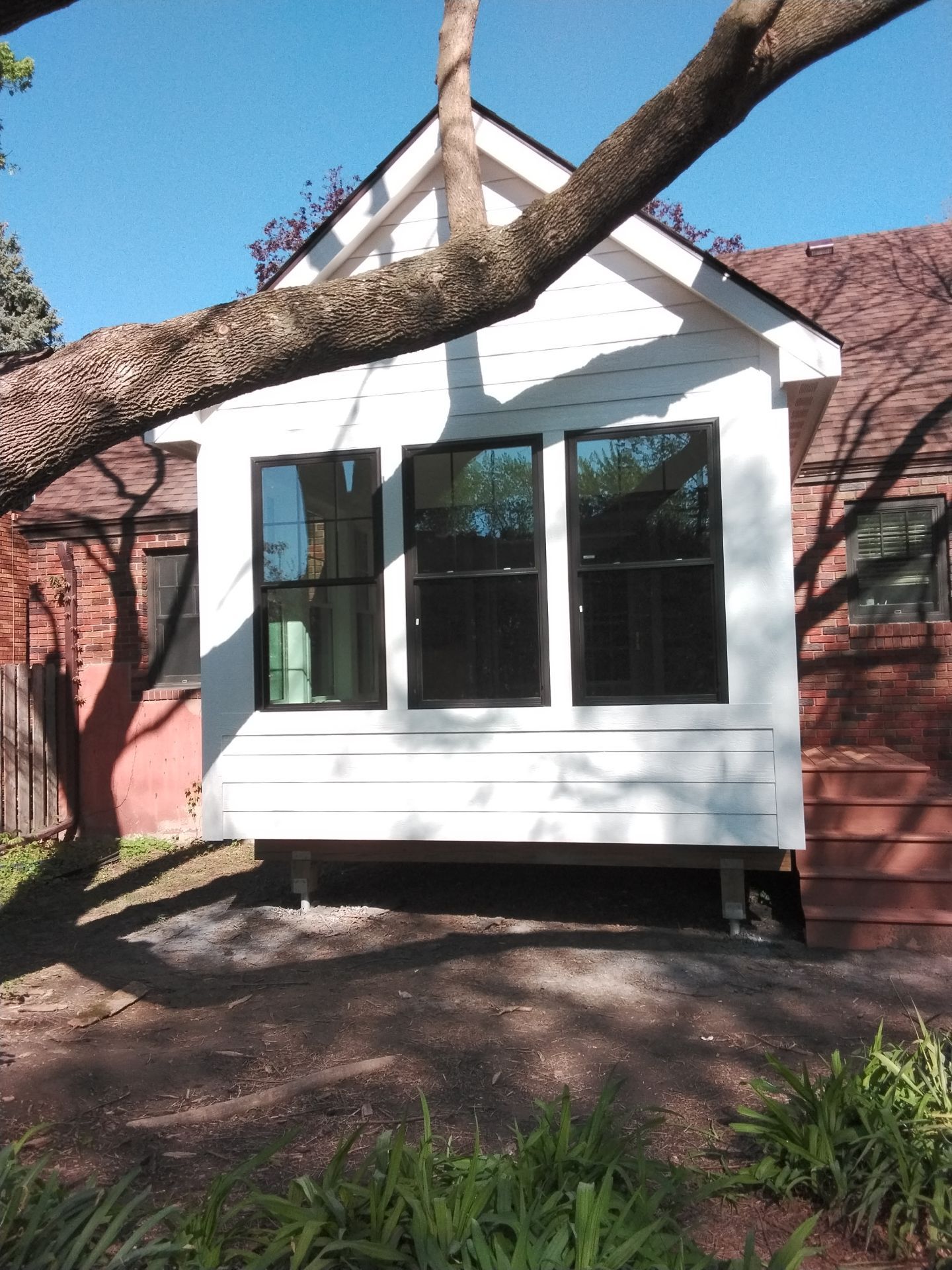 New 4 season room interior & exterior painting by Midwest Paint LLC