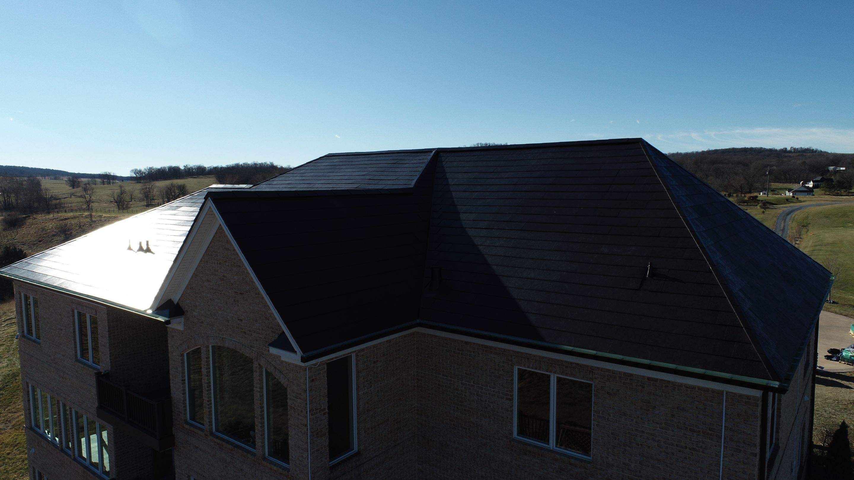 Tesla Solar Roof Replacement  by American Home Contractors