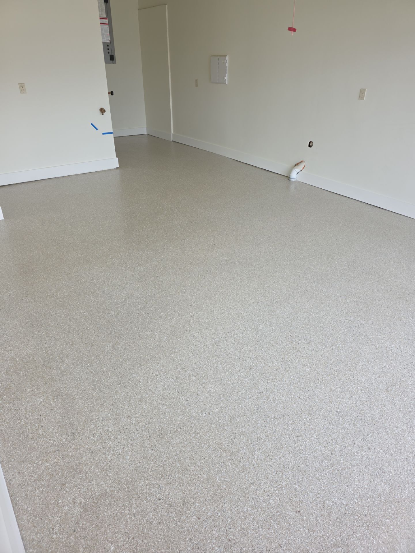 Garage Transformation using Sandstone by Croc Coatings, LLC