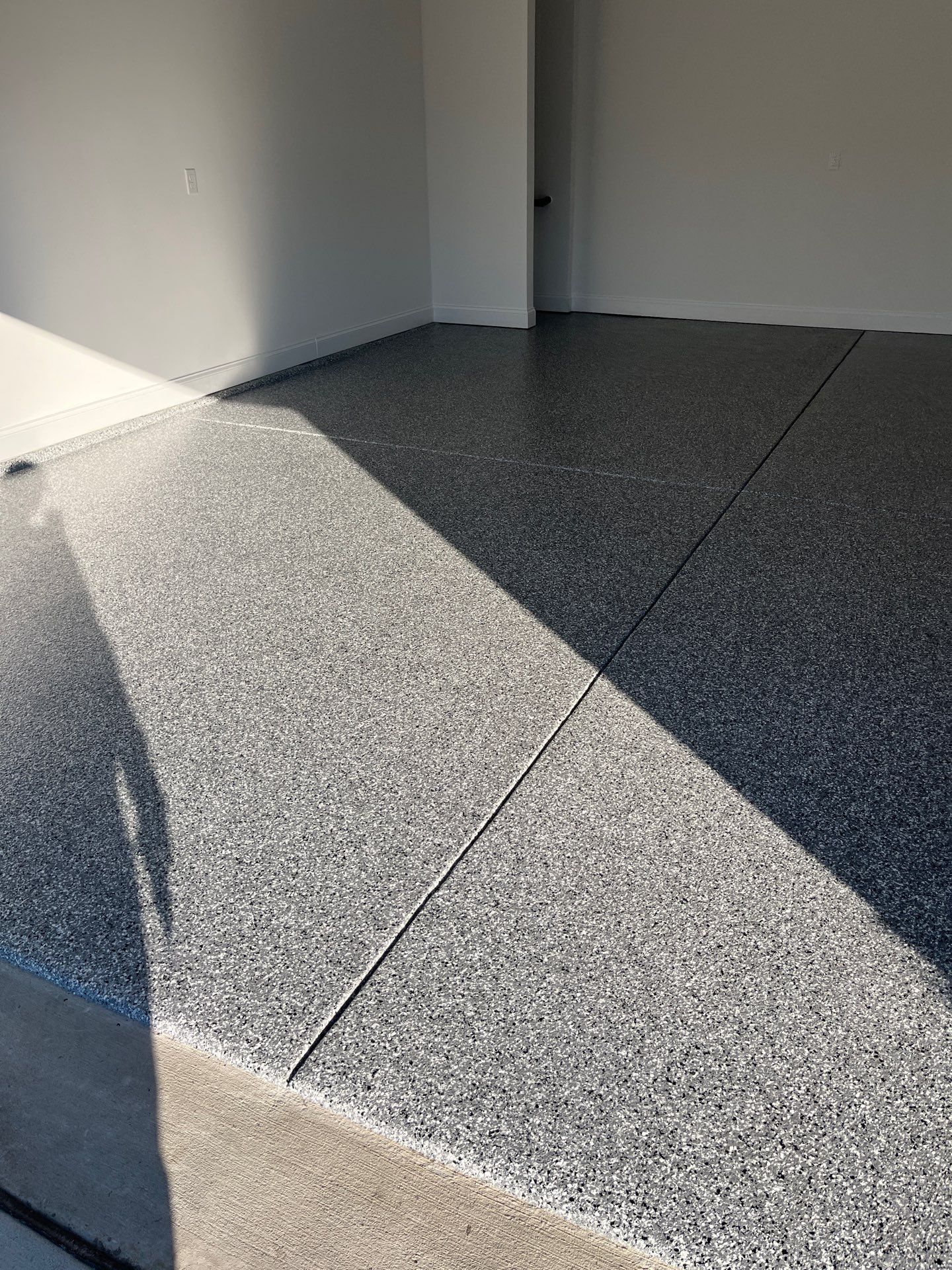 Garage Floor Coating using Wombat by My Garage Floor Guys