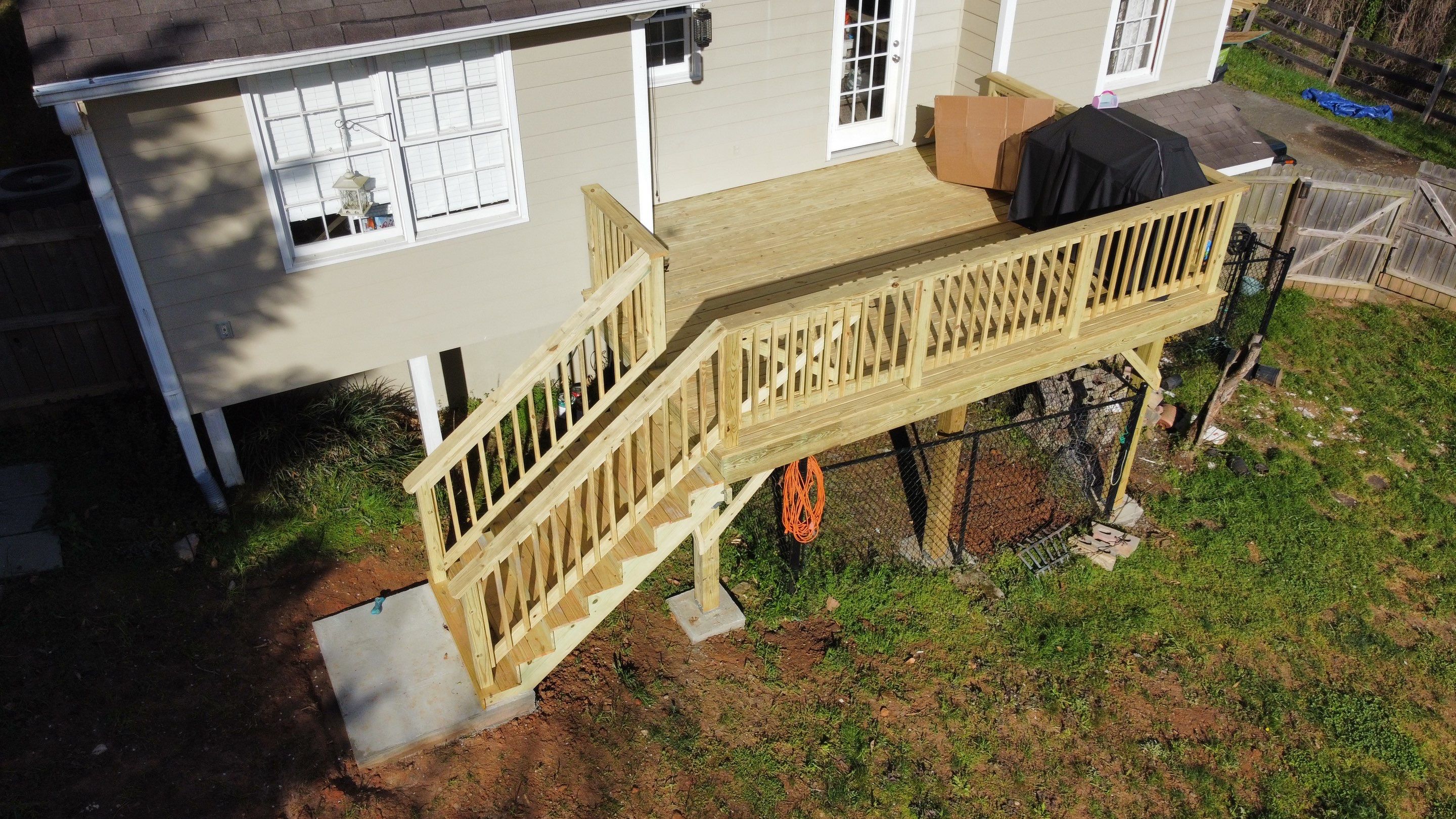 Elevated Pressure-Treated Wood Deck Replacement in Marietta by Swift Home Renovations
