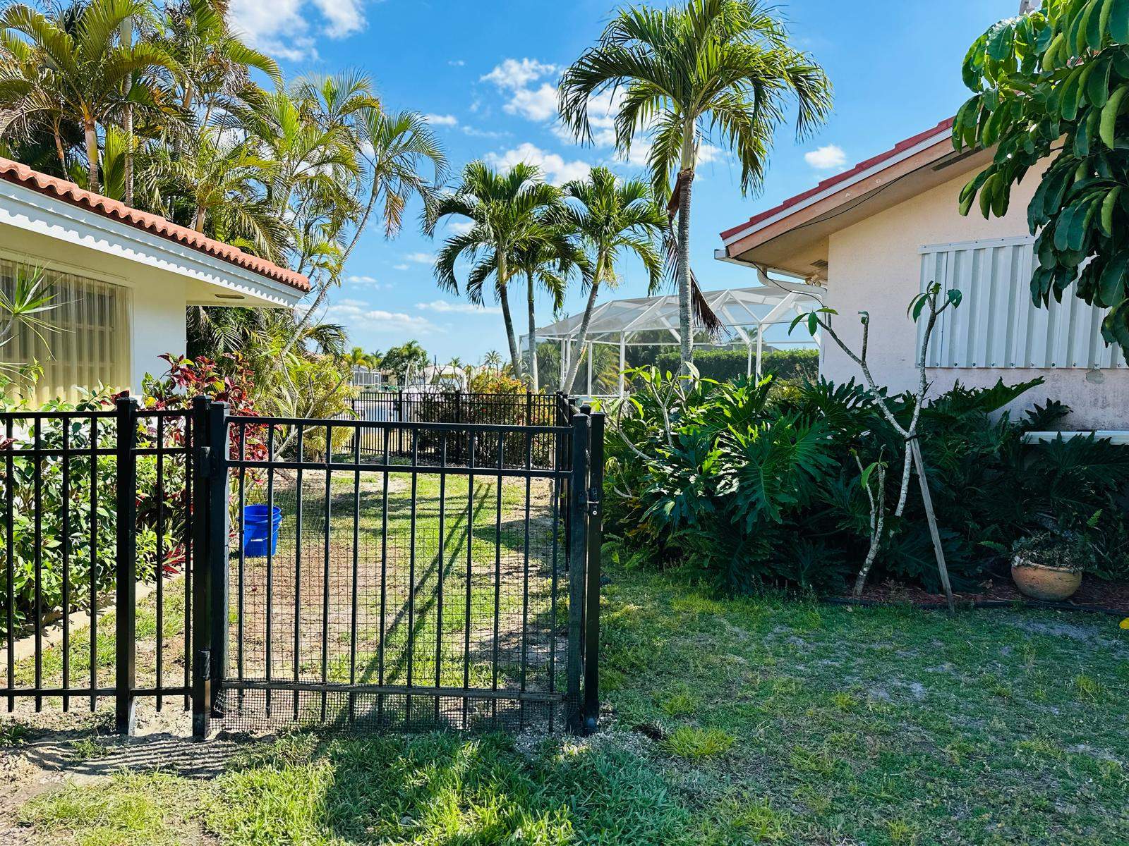 Waterfront Aluminum Picket Fence Installation in Punta Gorda by True Fence LLC
