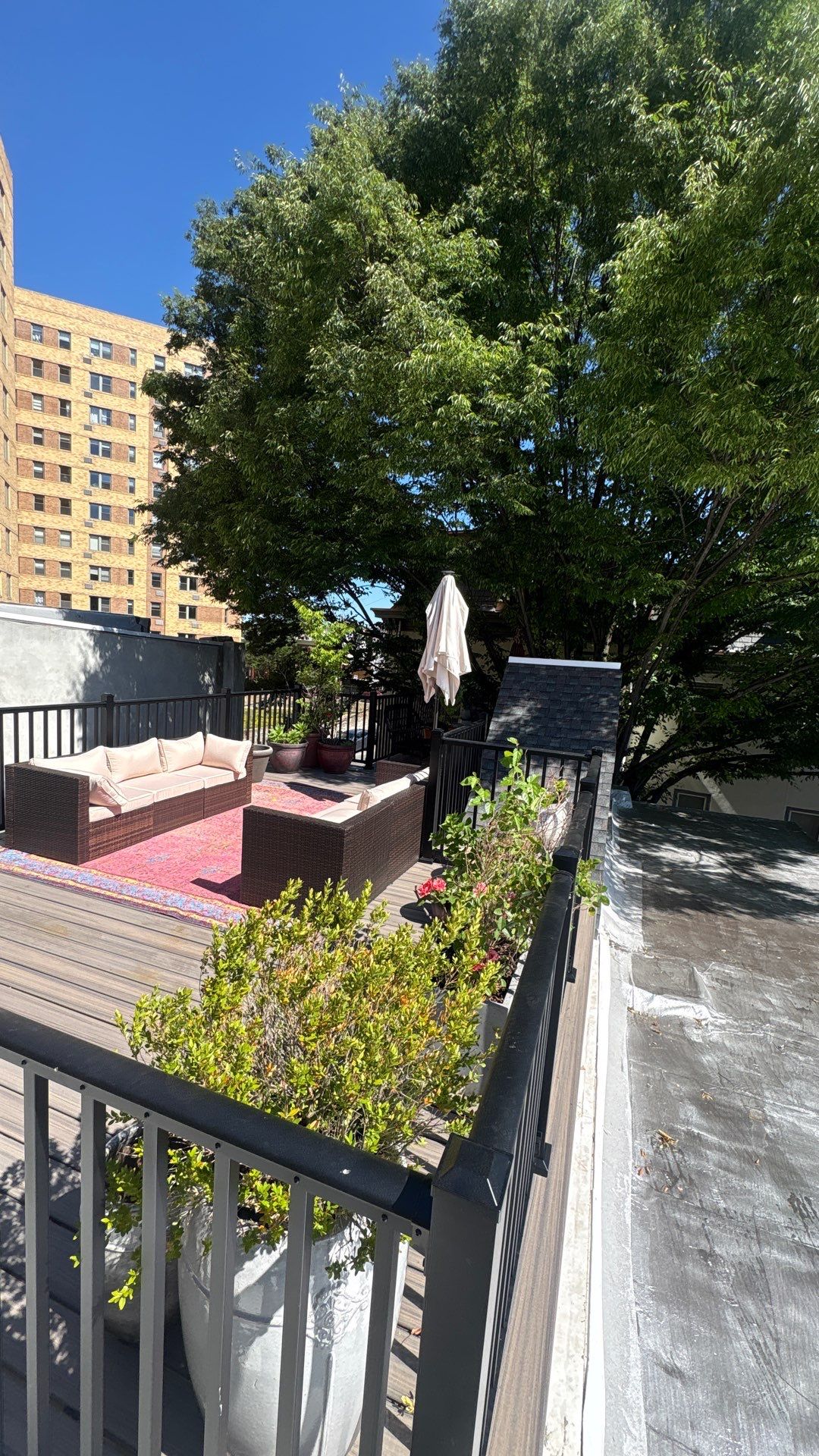 Roof Replacement and Custom Trex Roof Top Deck Project in Philadelphia, Pennsylvania by Philadelphia Quality Roofing