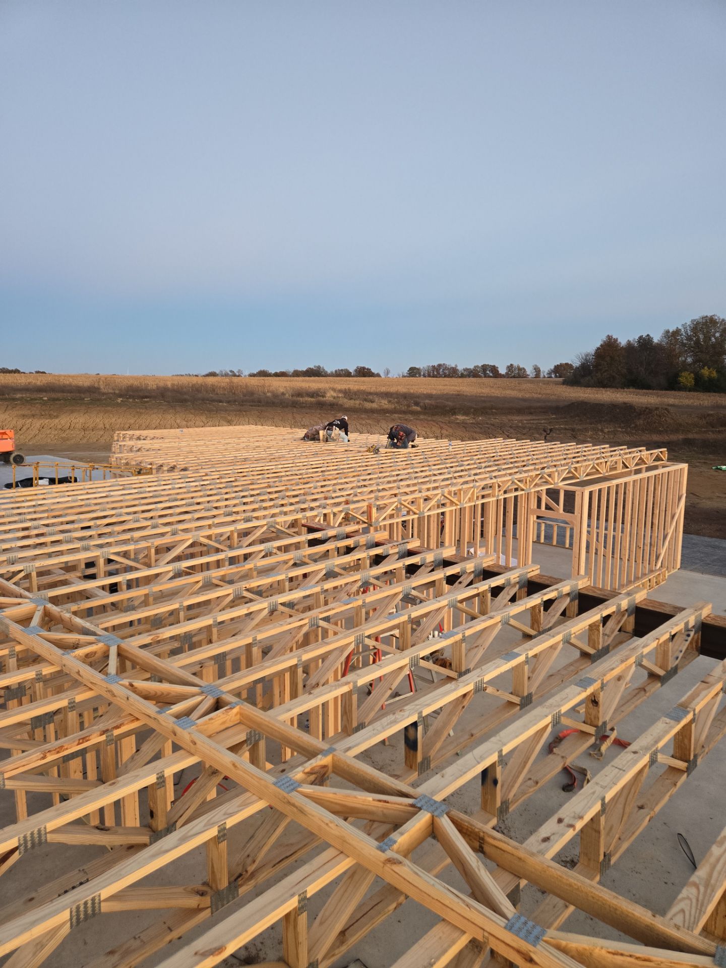 New Home construction w/ board and batten sides and metal roof  by Miles Construction 