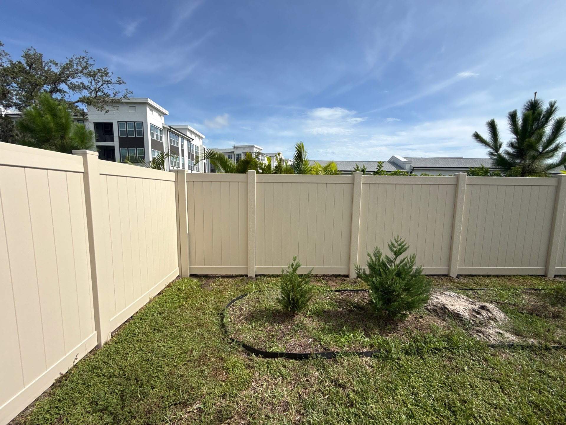 Residential Tan Vinyl Privacy Fence Installation in Nokomis by True Fence LLC