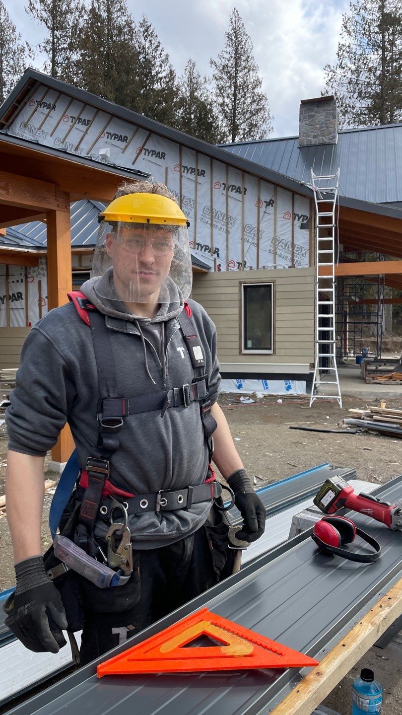 Residential Roofing Installation using 12" Prolok metal by Top Notch Roofing Inc